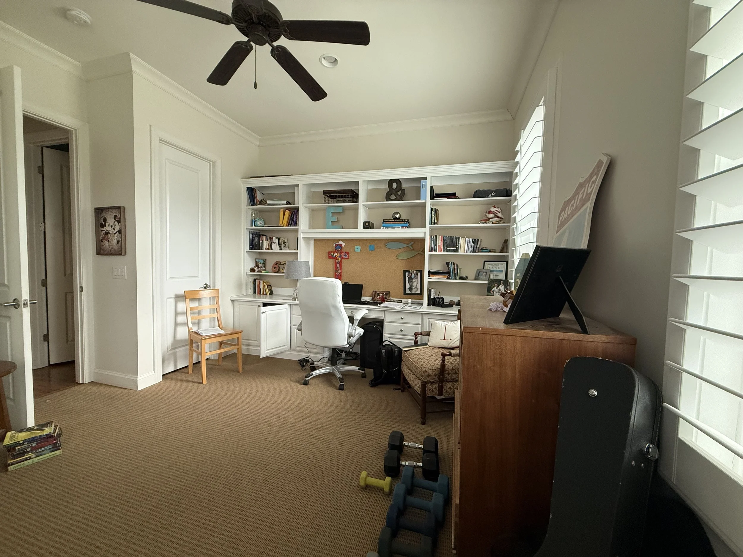 Built-in bookshelves before