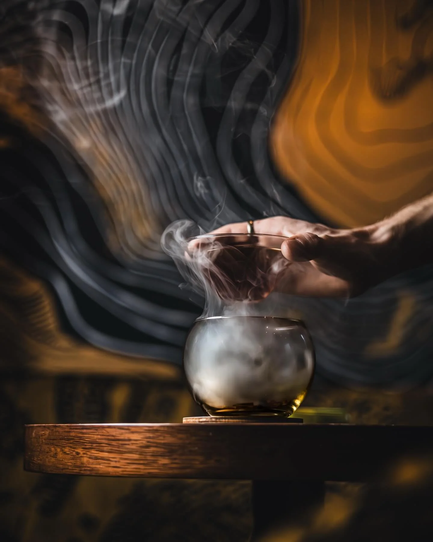 Aromatic Rhapsody 

Peated Scotch / Apricot Liqueur / Averna / Bitters

Aromatic Rhapsody is a testament to the ancient art of aromatic alchemy. But the true magic lies in the presentation: served over smoldering sandalwood, this cocktail is infused 