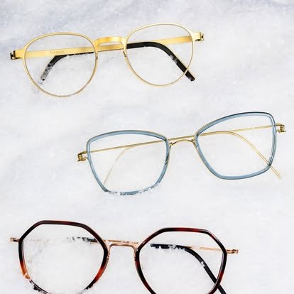 Three pairs of eyeglasses with different frame styles and colors on a white background.