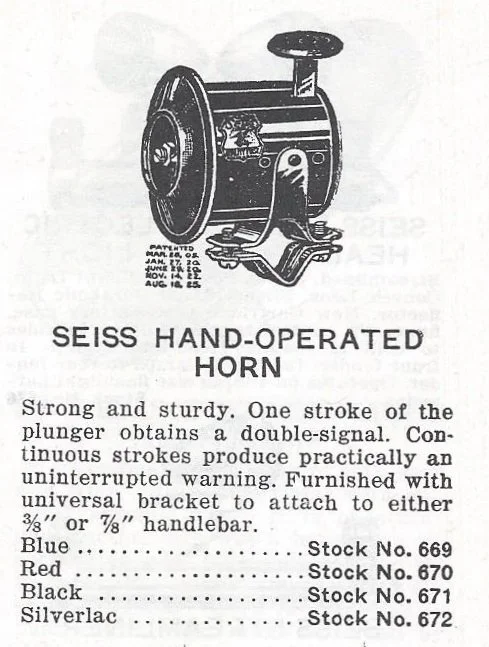 Black and white illustration of a Seiss hand-operated horn with a large wheel and handle, labeled with stock numbers for different colors.