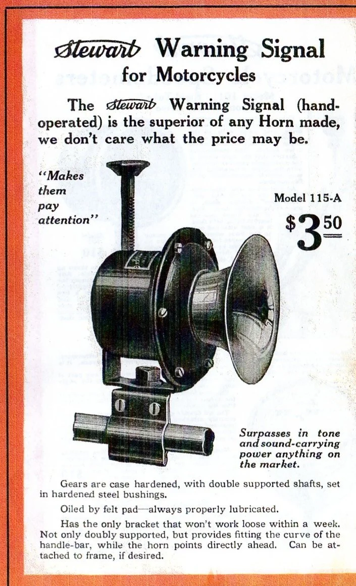 A vintage advertisement for the Stewart Warning Signal for Motorcycles, priced at $3.50, featuring an illustration of a motorcycle warning signal with a large horn and handlebar, highlighting its superior tone and sound-carrying power.