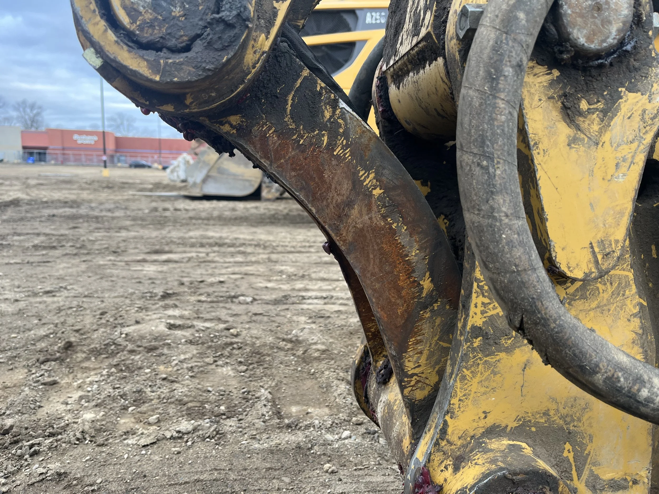 Damaged Excavator H-link on job site. Repaired by mobile mechanic