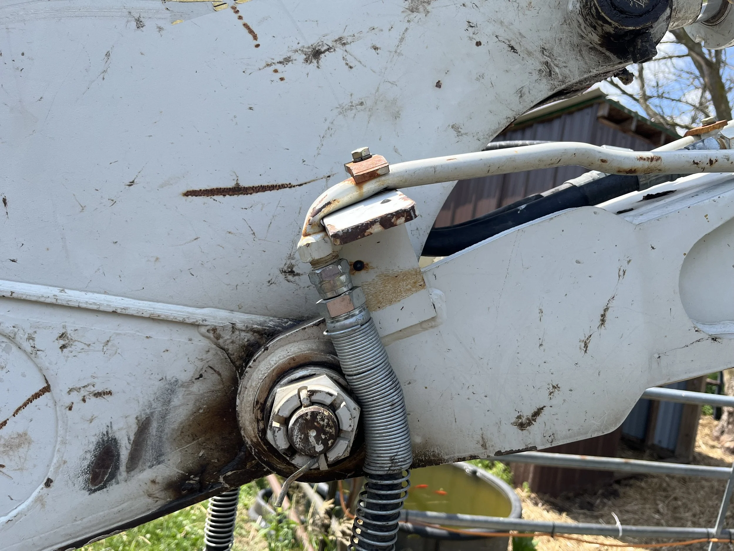 Bent steel line on a Takeuchi Excavator