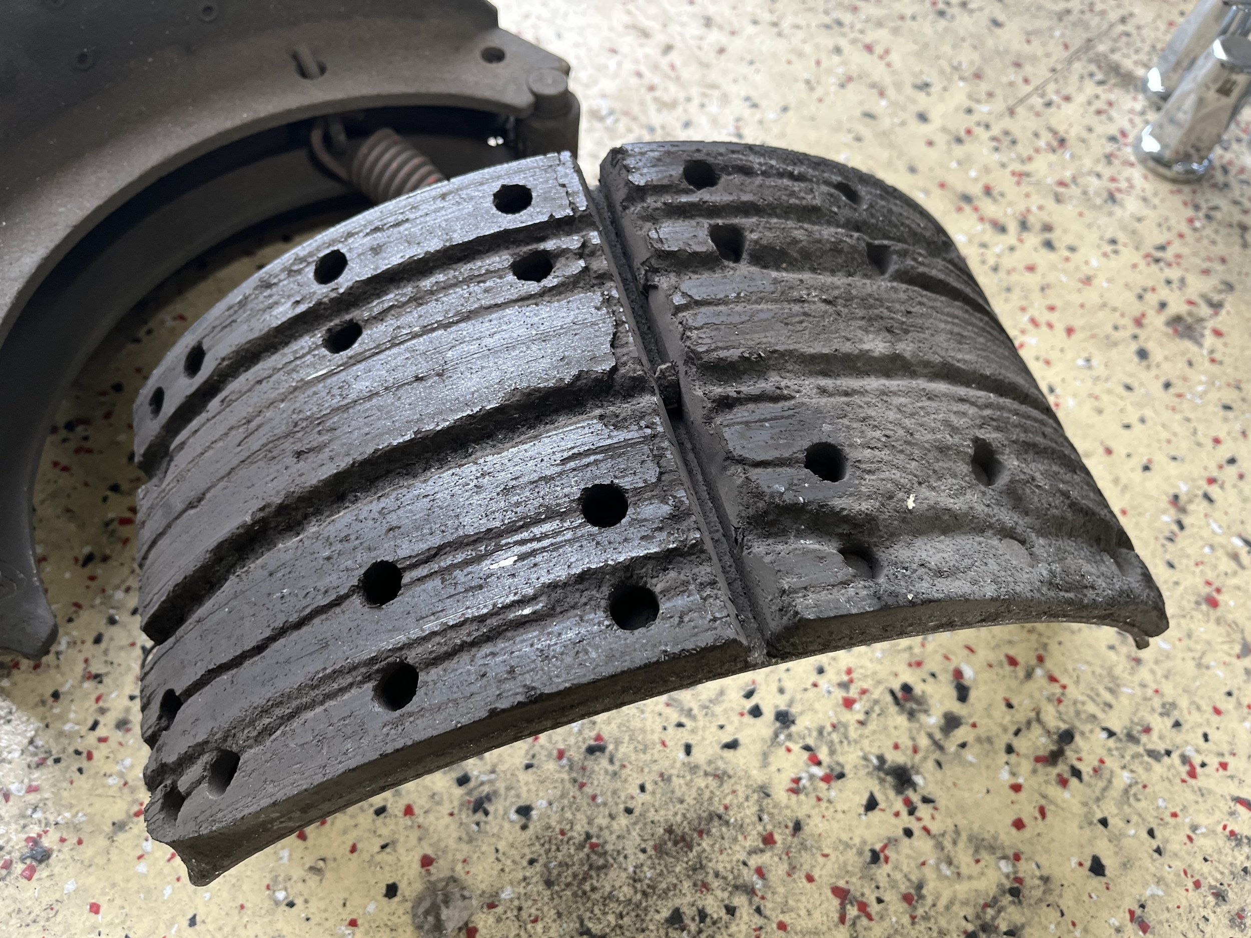 Brake shoes damaged from stone/debris getting in drum