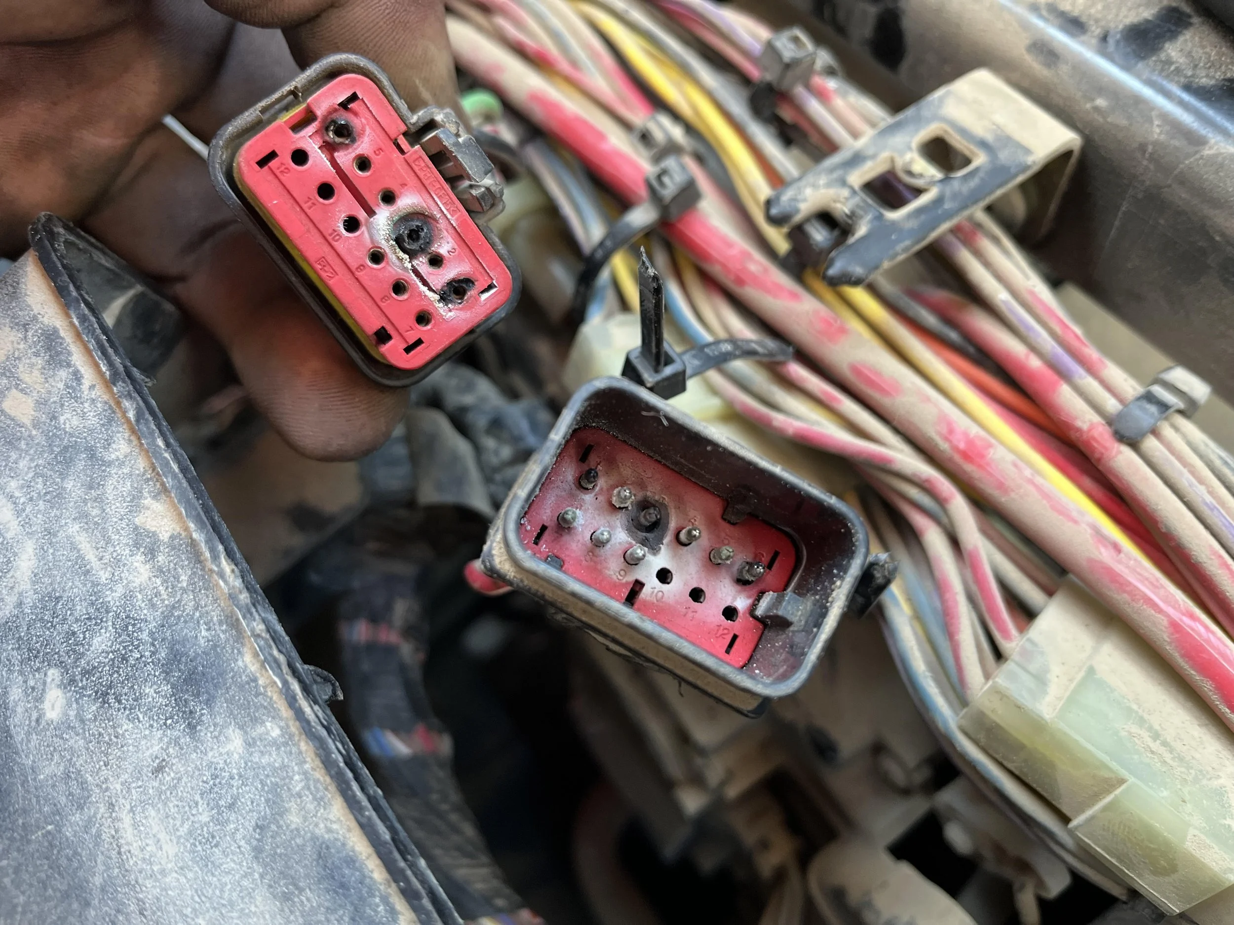 Electrical repair on HVAC in a 345 Cat Excavator
