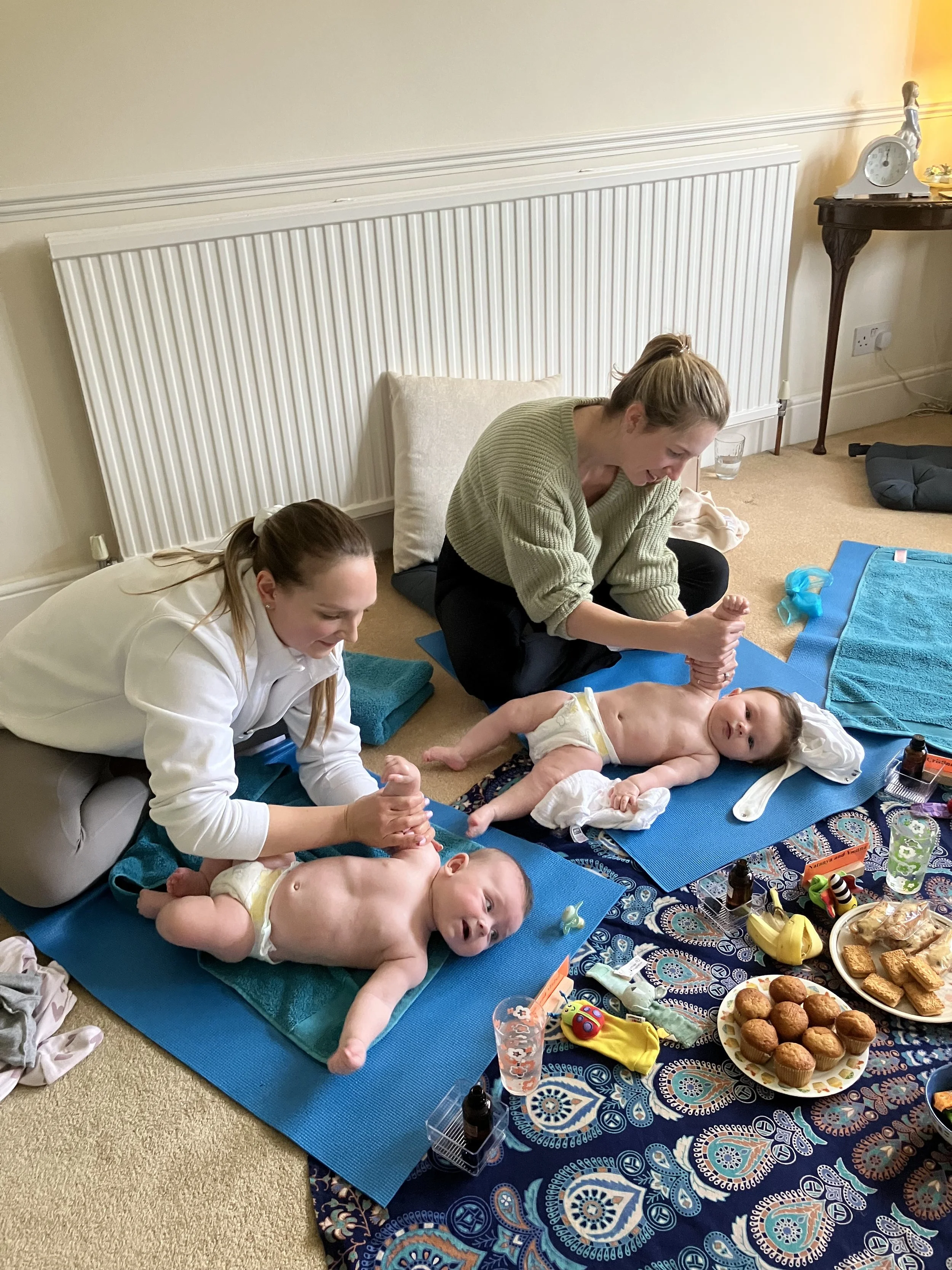 photo two mums massaging arms.jpeg