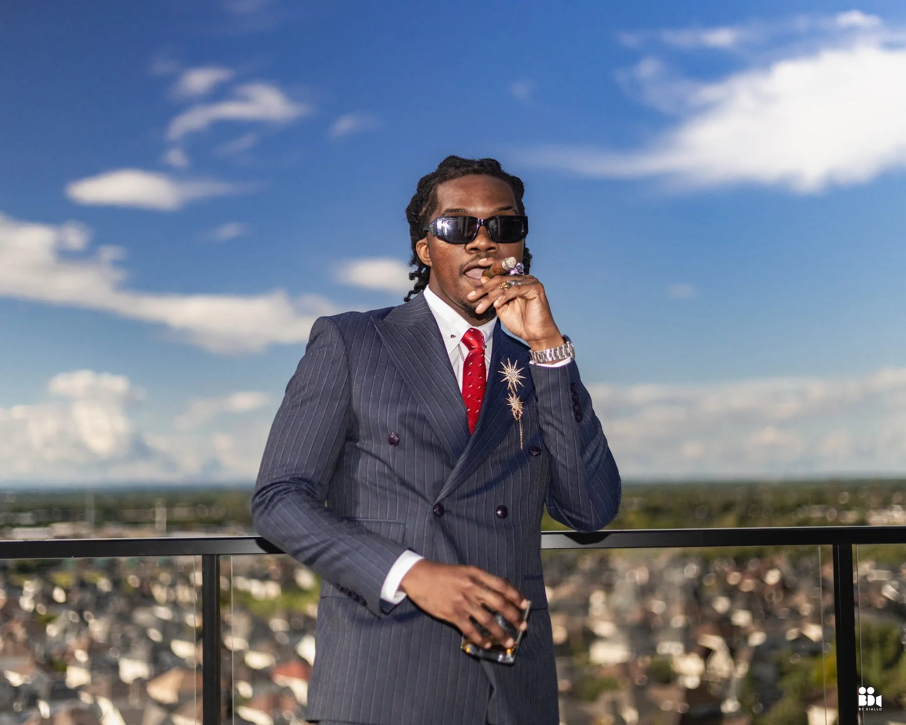 Fashion portrait of a man in a suit photographed in Montreal by photographer Shot by Diallo