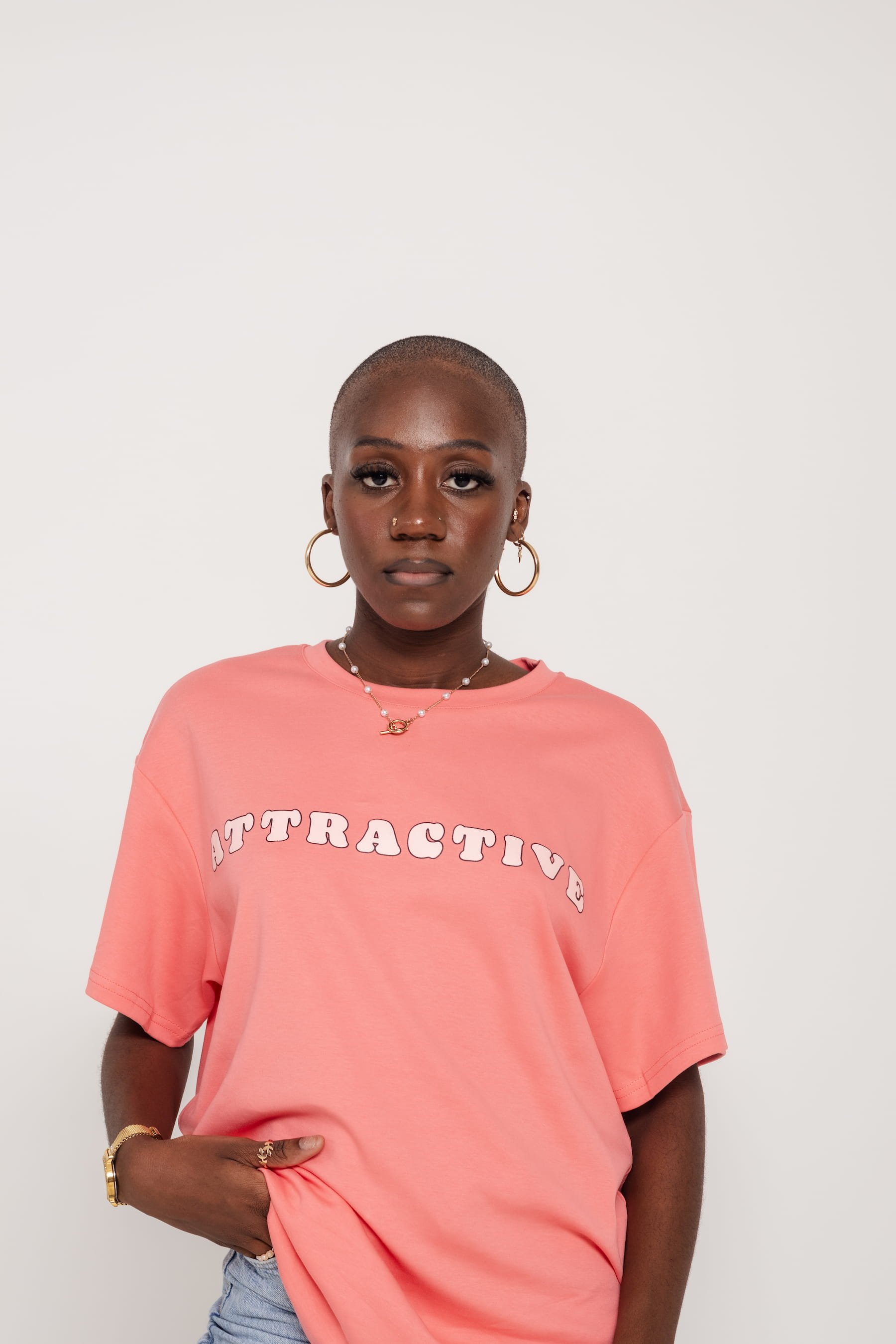 Studio portrait of model wearing Attractive brand clothing photographed by Shot by Diallo