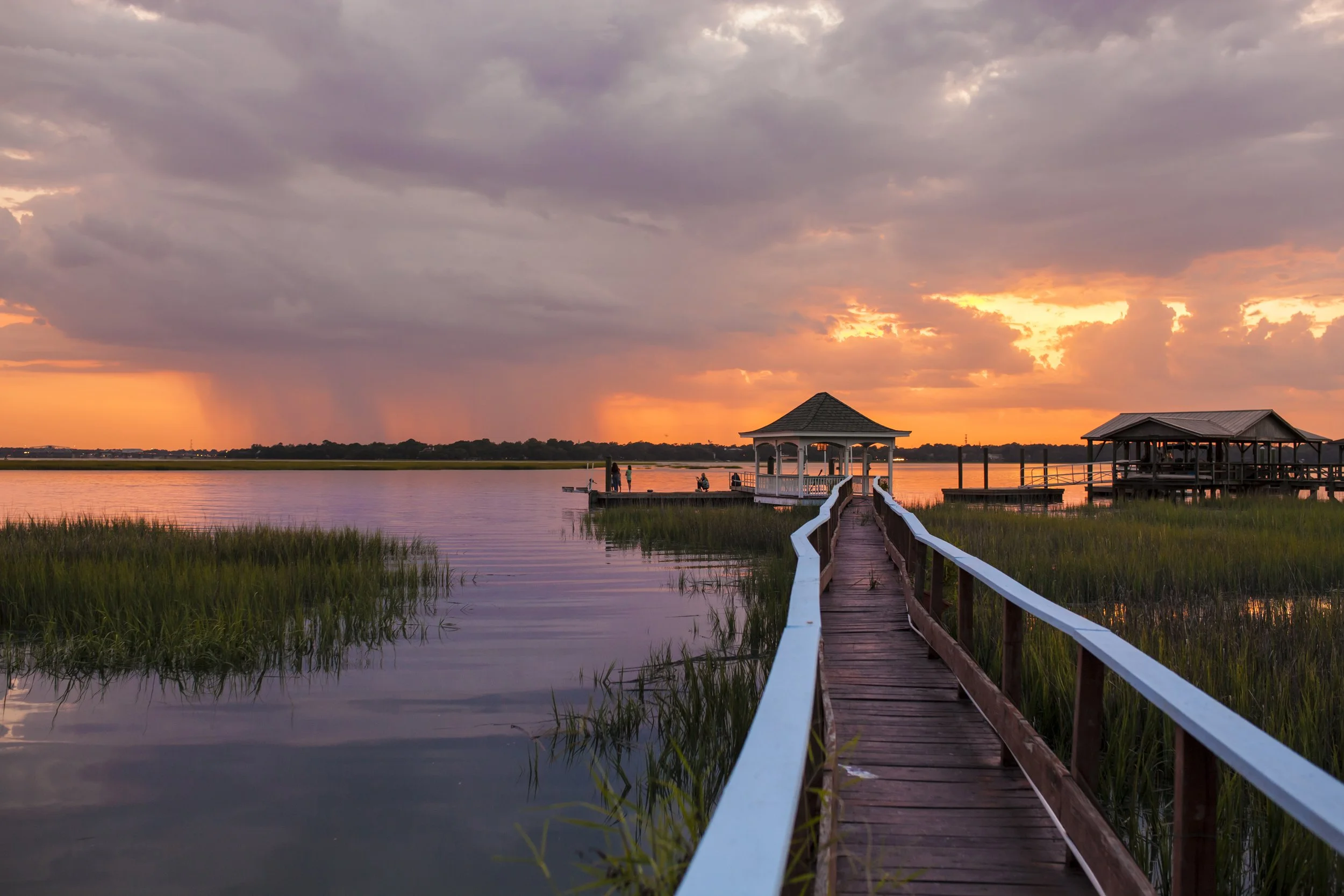 family-on-dock-at-sunset-2021-08-26-16-22-43-utc.jpg