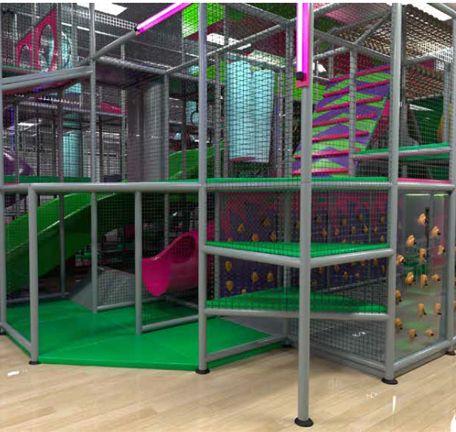 Indoor children's play structure in Wakefield with green slides, climbing nets, and colorful elements in a play area.