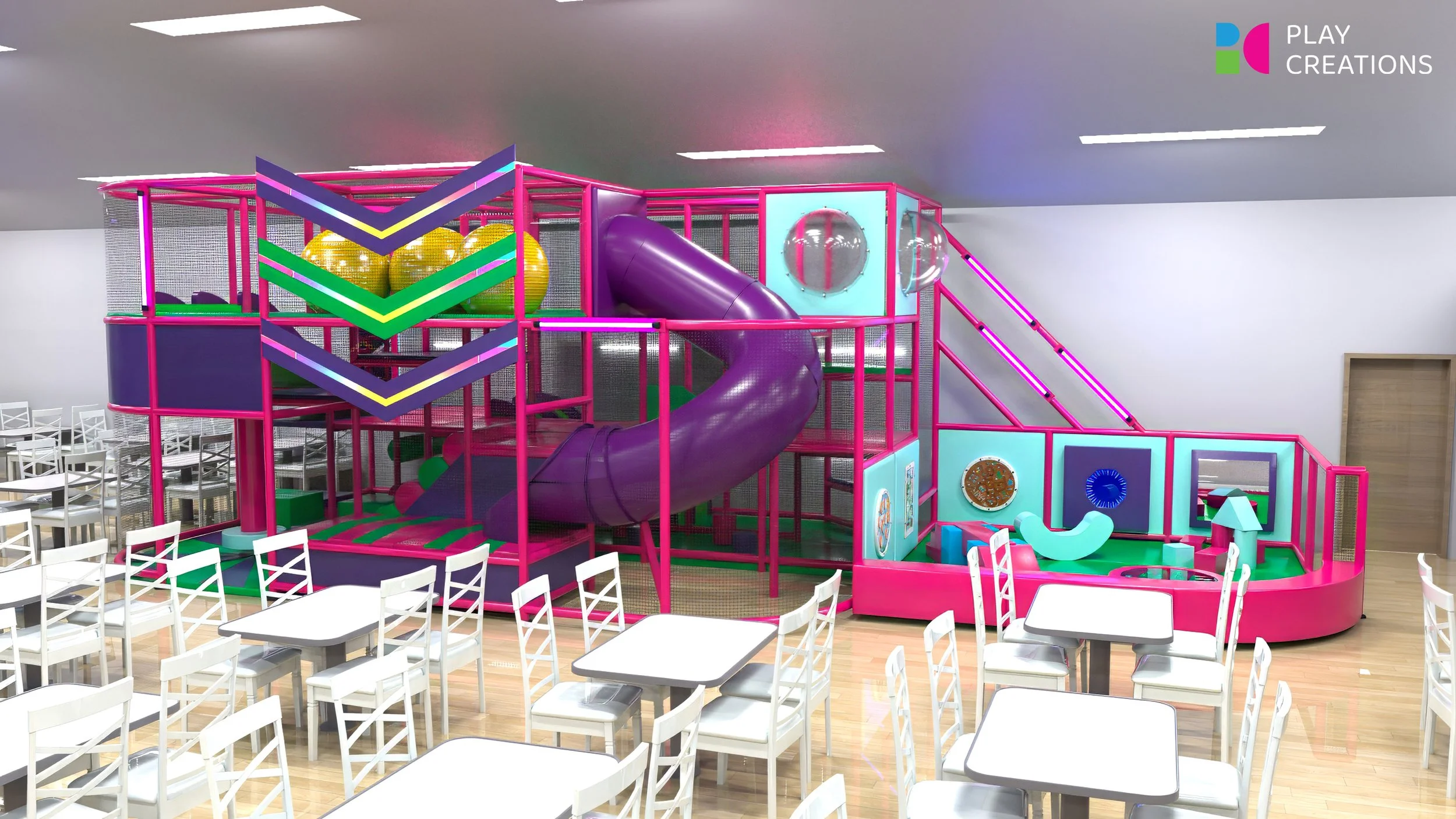 Indoor children's play area with a pink and purple multi-level structure, slides, ball pits, and climbing features, adjacent to a dining area with white tables and chairs.
