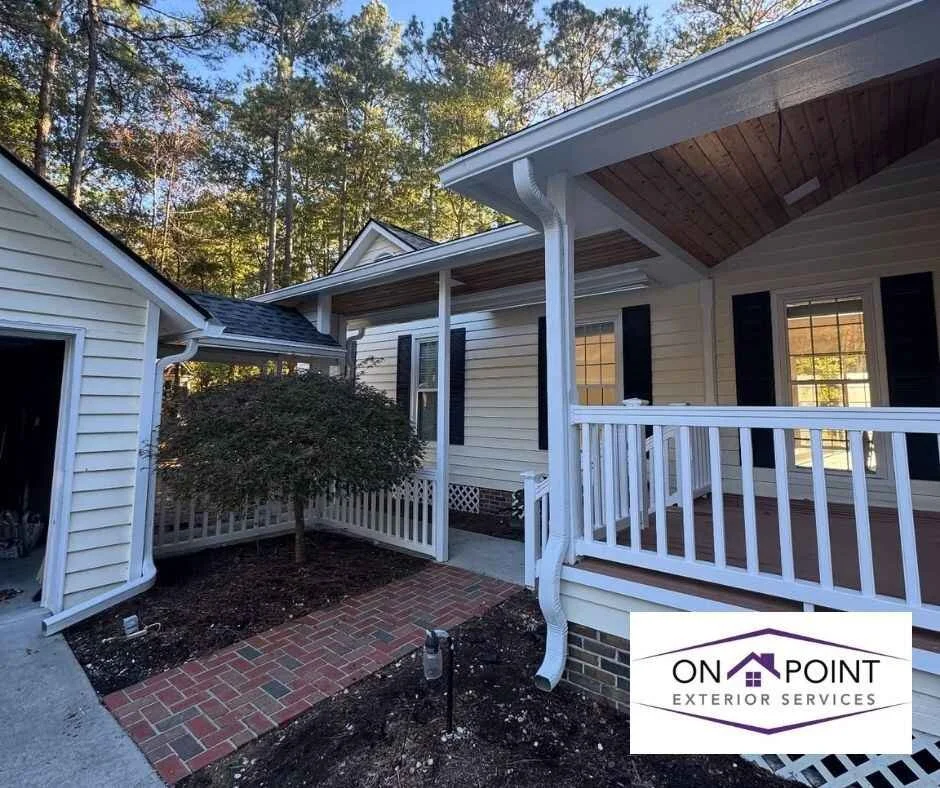 Gutter downspout Installation & Repair in Myrtle Beach, SC with crew installing new gutter downspouts on a residential home