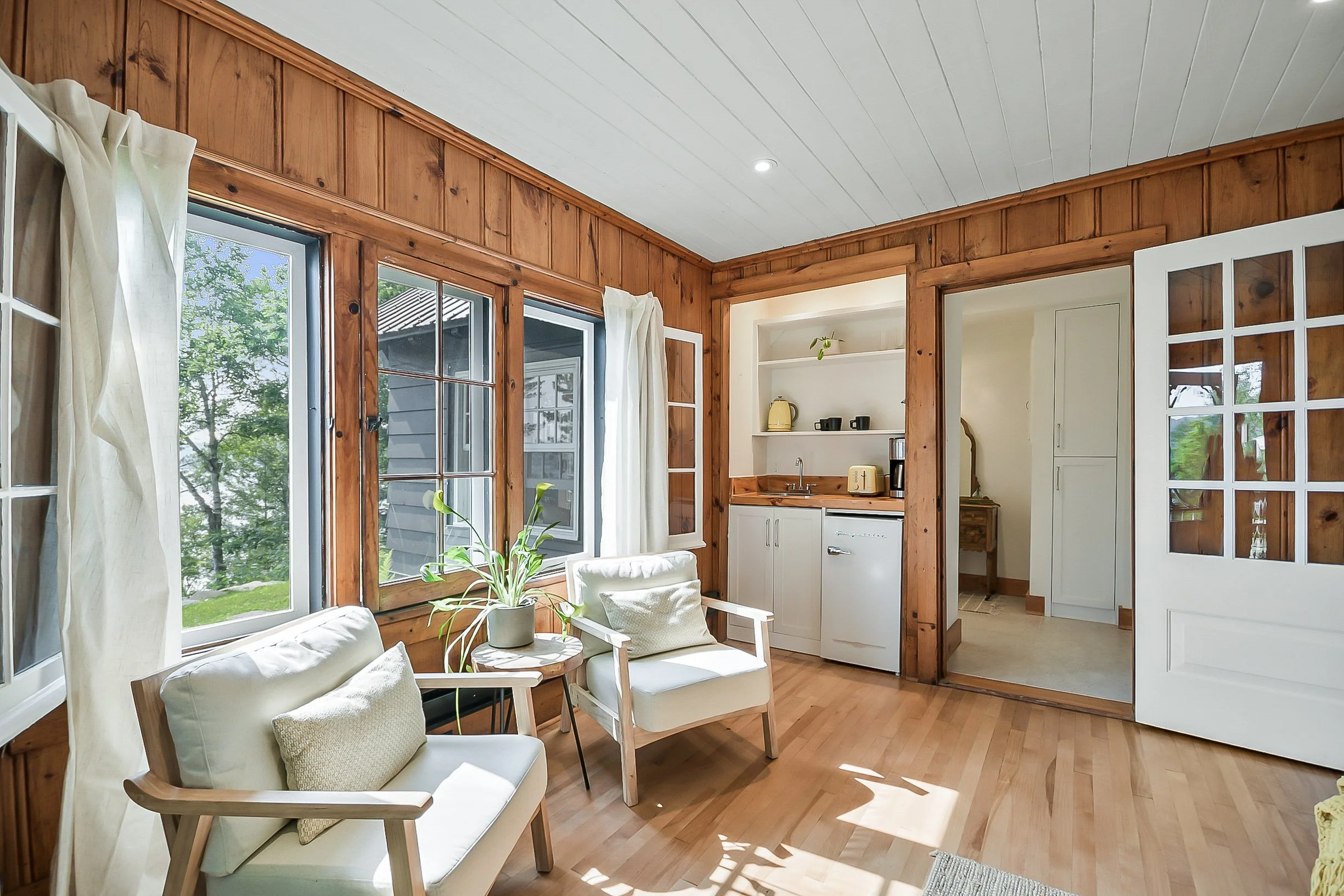 Living area in private cabin with sofa bed