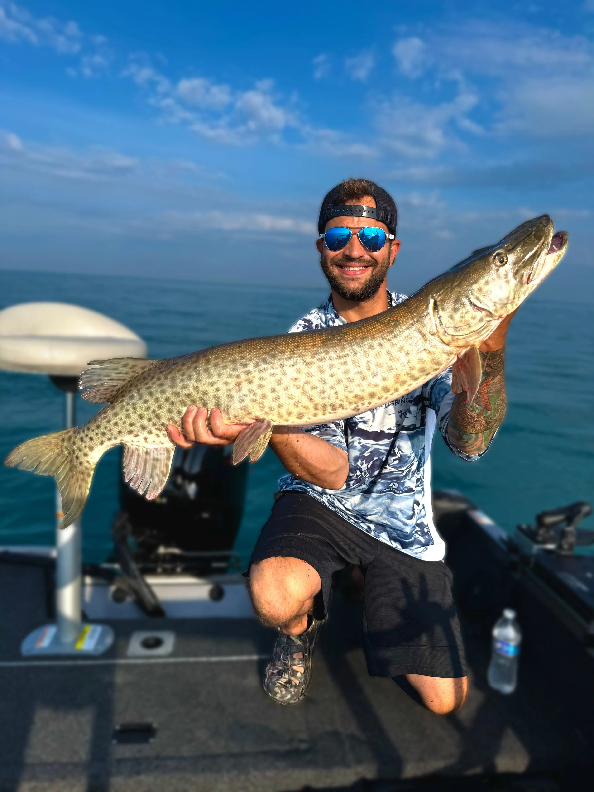 Charter guest with a nice muskie catch on Lake St. Clair