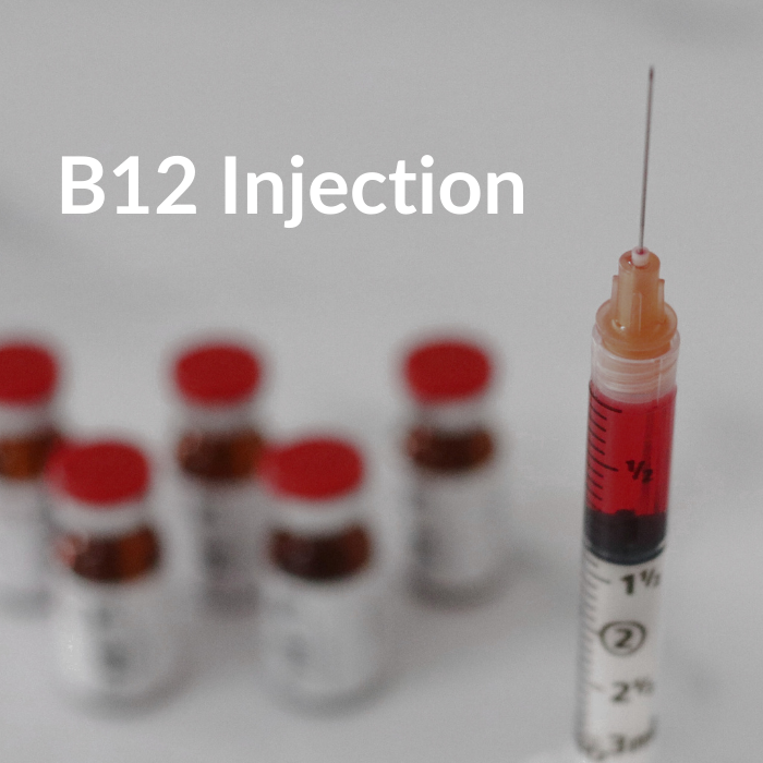 a photo of B12 vials and a B12 injection needle