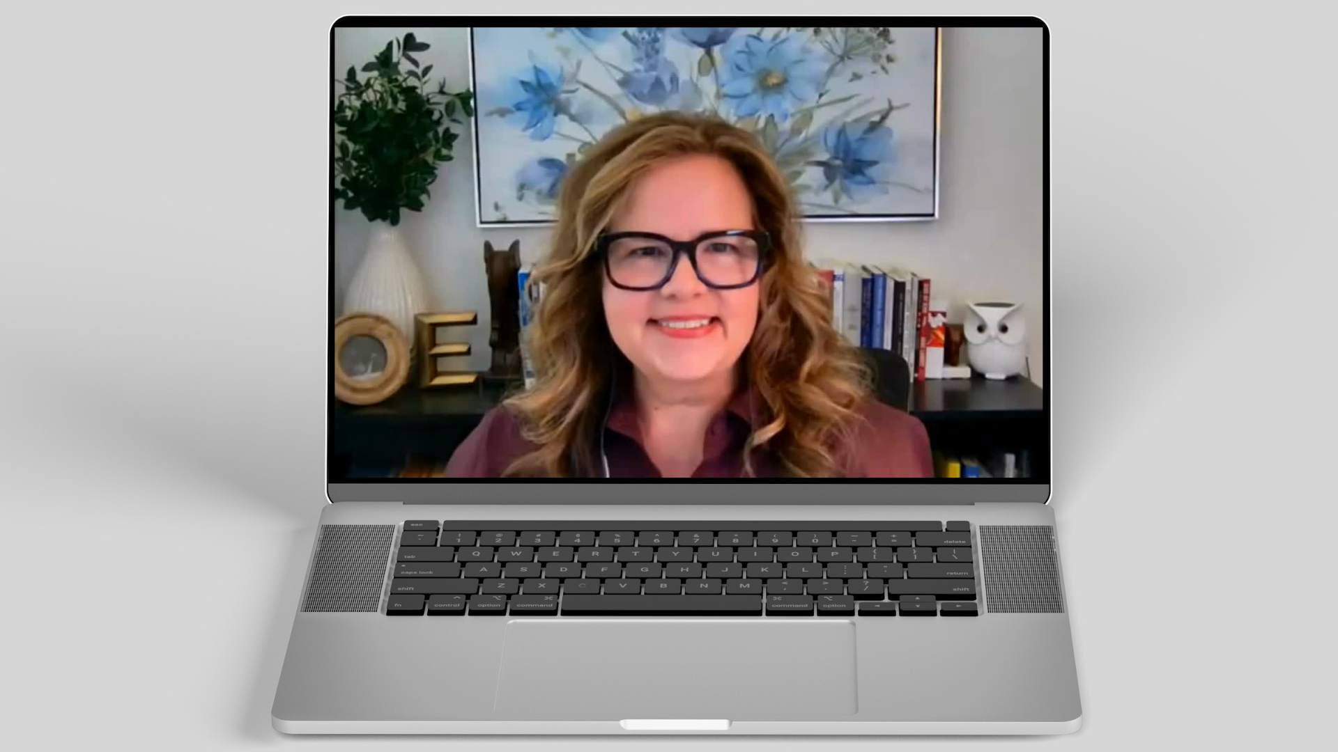 Lisa English, Leadership & Executive Coach and Strategic Consultant, smiling on a laptop screen, hosting a webinar.