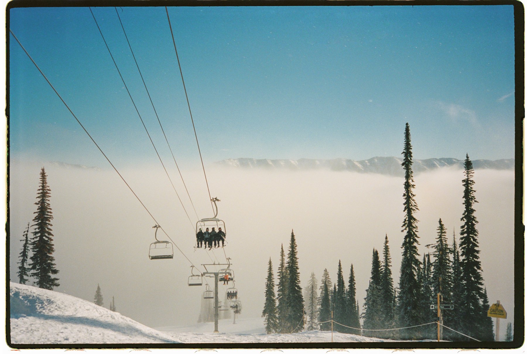 ski chairlift top of the mountain at ski resort Fernie, British Columbia on 35mm film analog