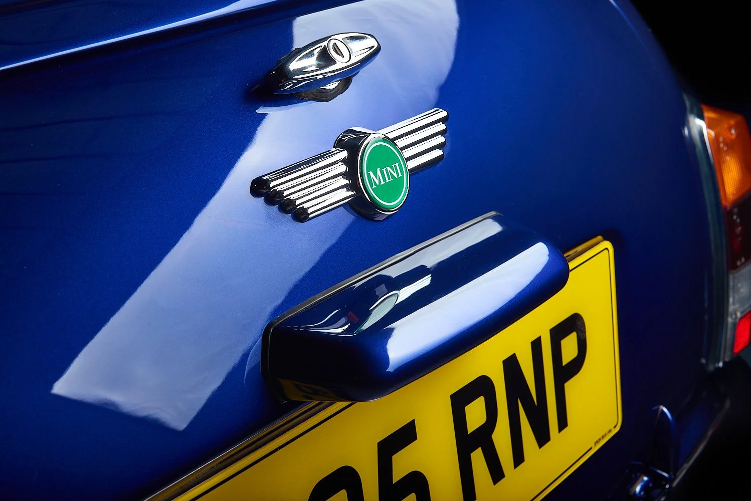 lassic car badge and emblem detail photography Mini Cooper