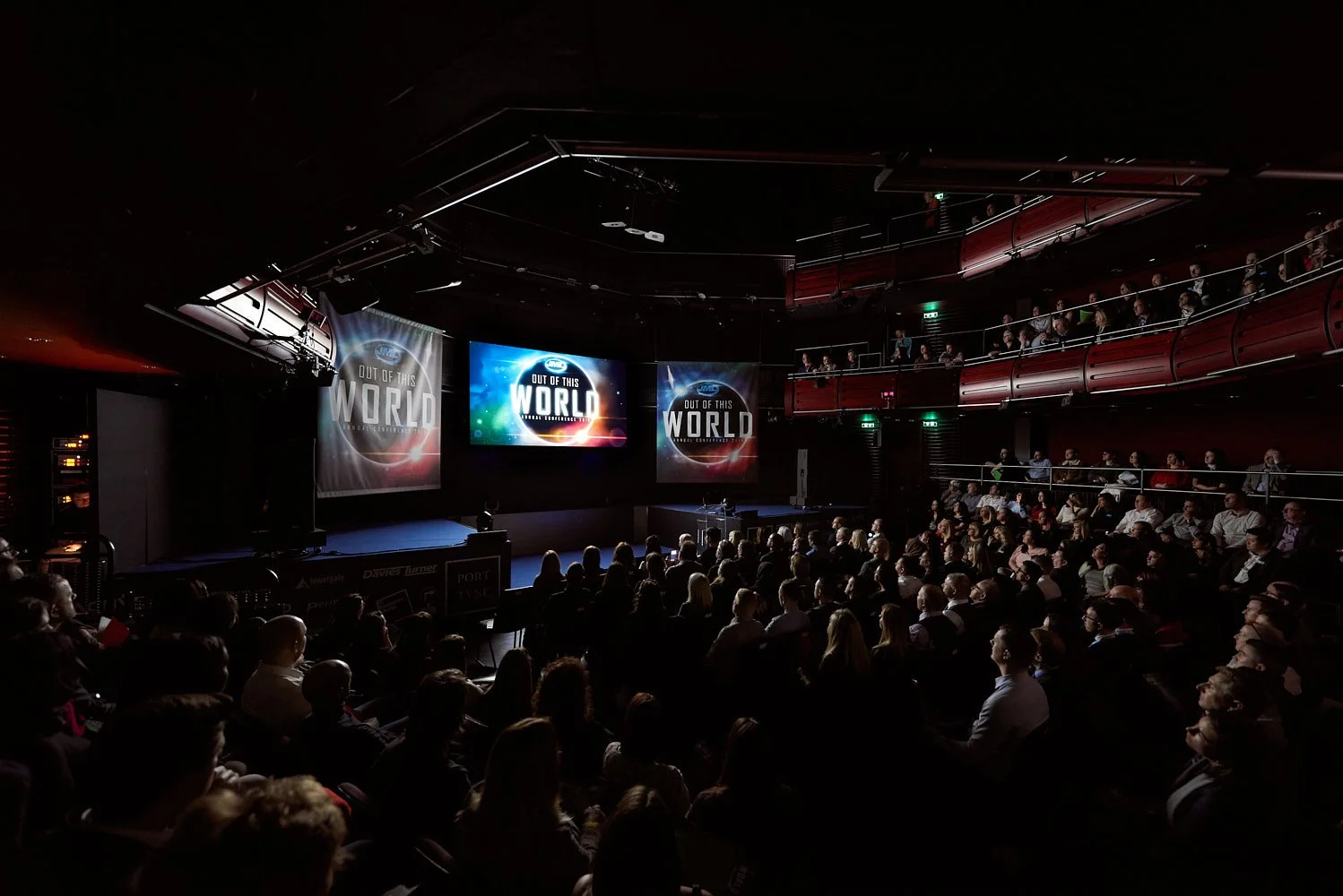 Business professionals networking at corporate event for JML