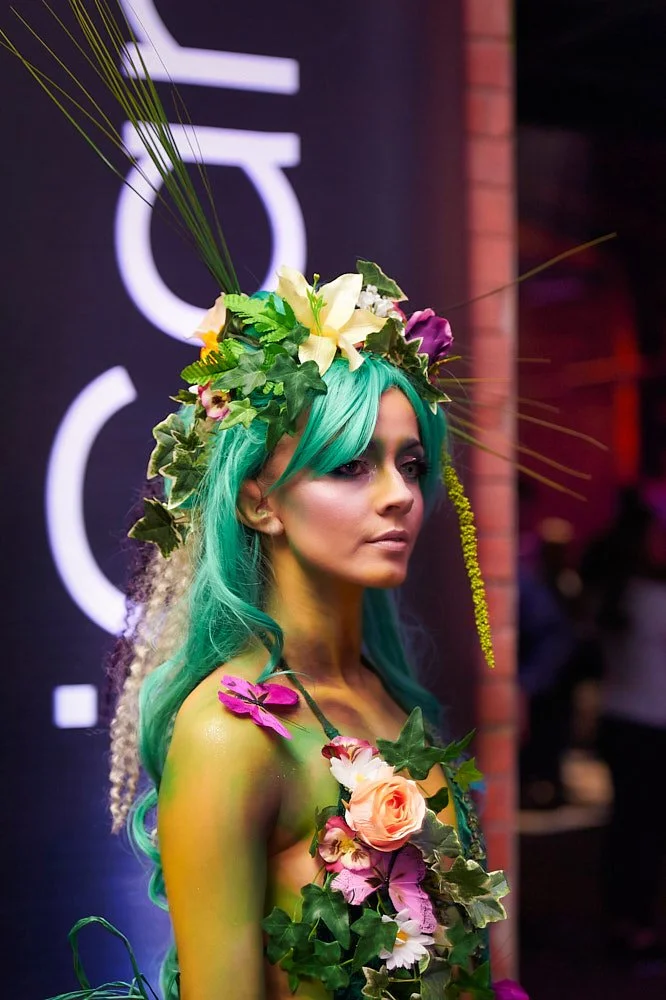 Festival-style corporate event with large crowd and staging for iCandy