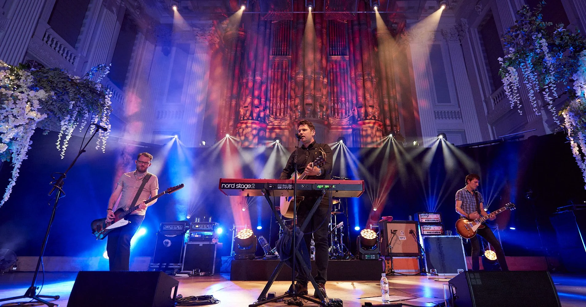 Live band performing at company celebration event Scouting For Girls