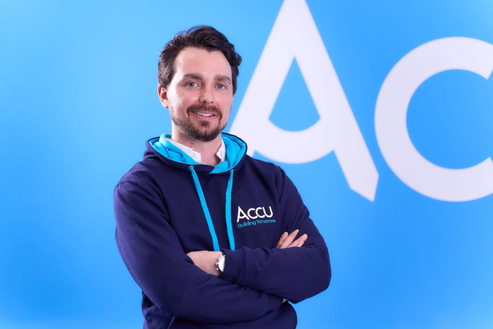 corpoarte-head-shot-with-branding-background-accu-honley-huddersfield.jpg
