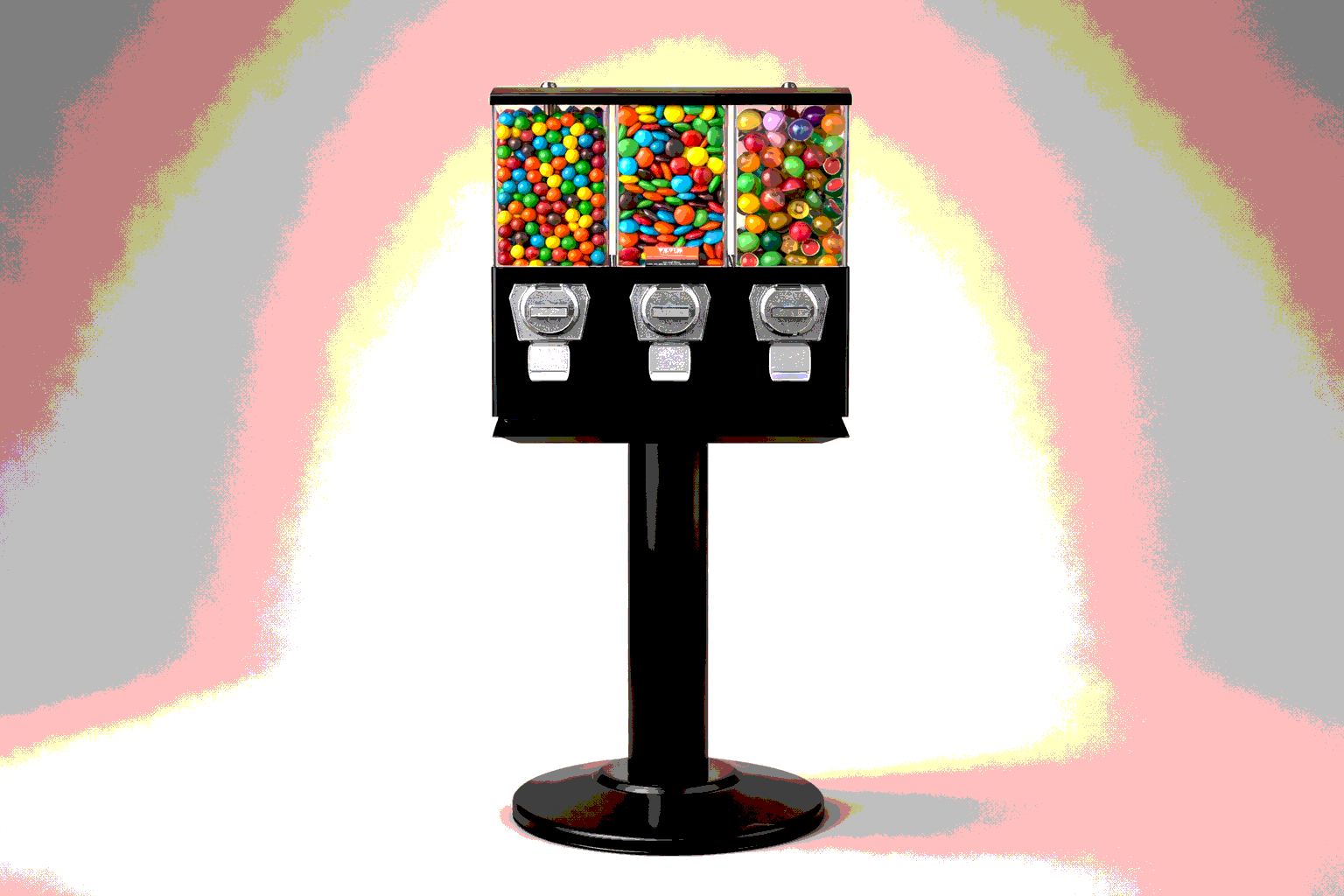 A gumball vending machine with three compartments filled with colorful gumballs, standing on a black pedestal.