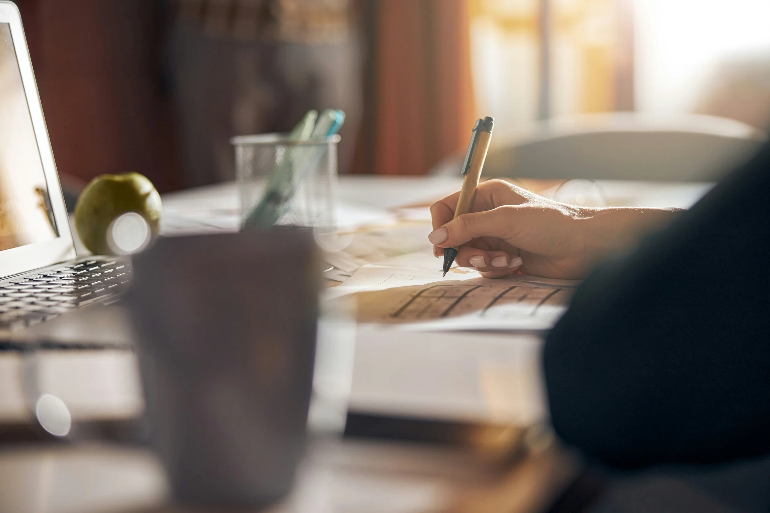 a person filling out a form