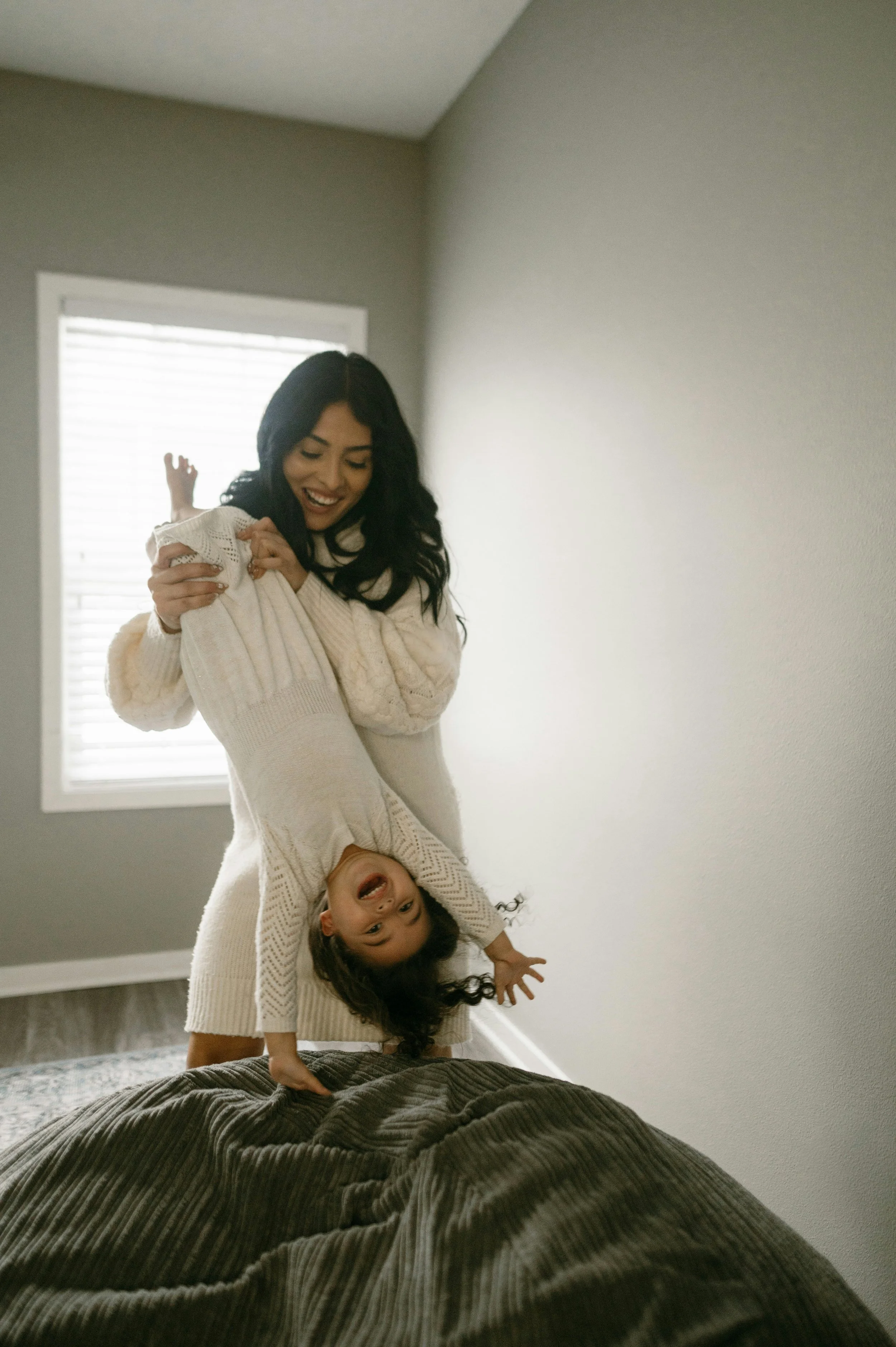 mother playing with child