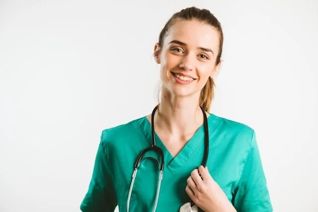Emergency nurse in scrubs with stethoscope representing frontline trauma and PTSD treatment support in Ogden Utah