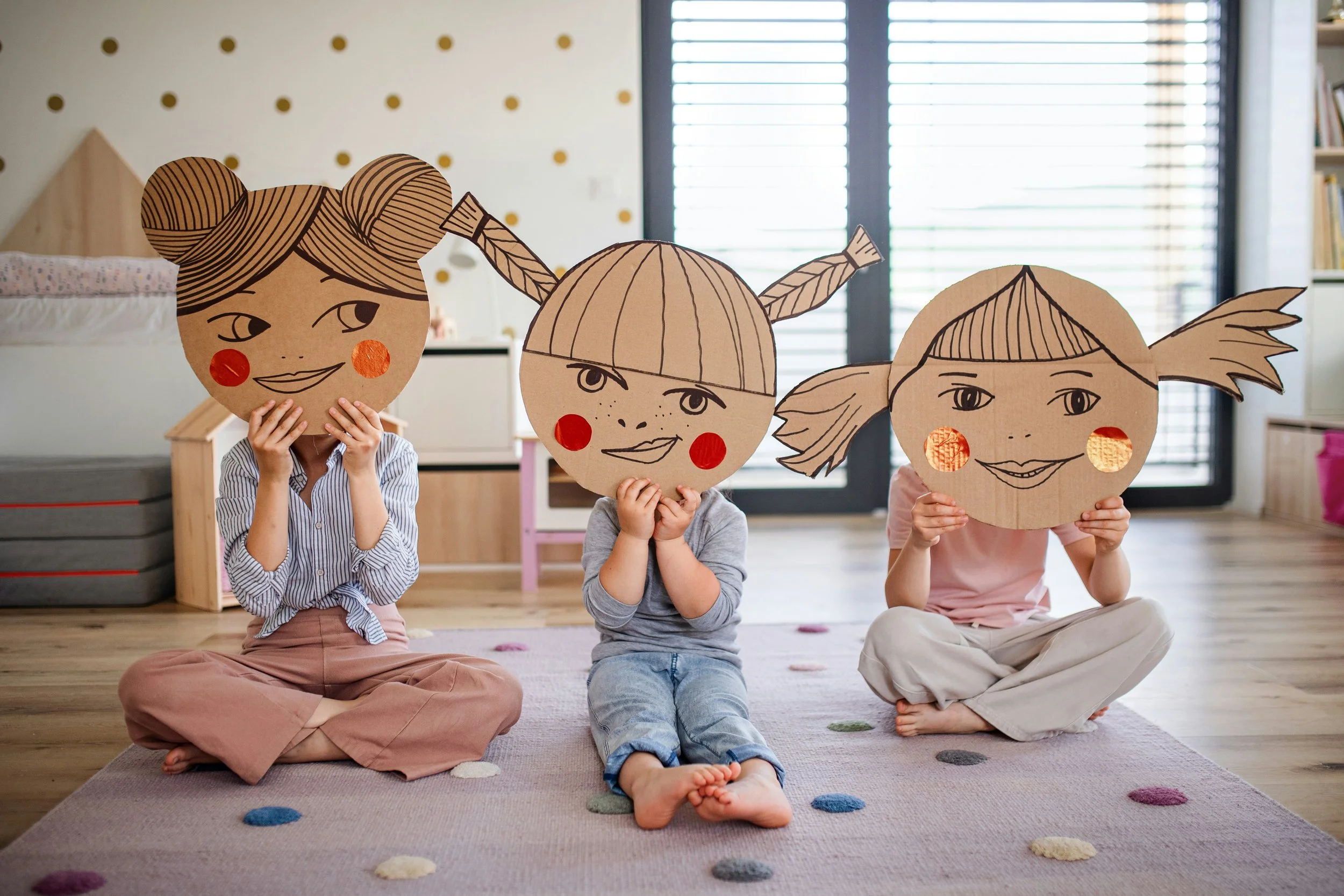 three kids with masks