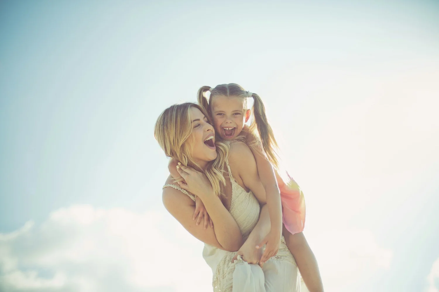 Mother and child laughing together, child psychiatry in Ogden Utah