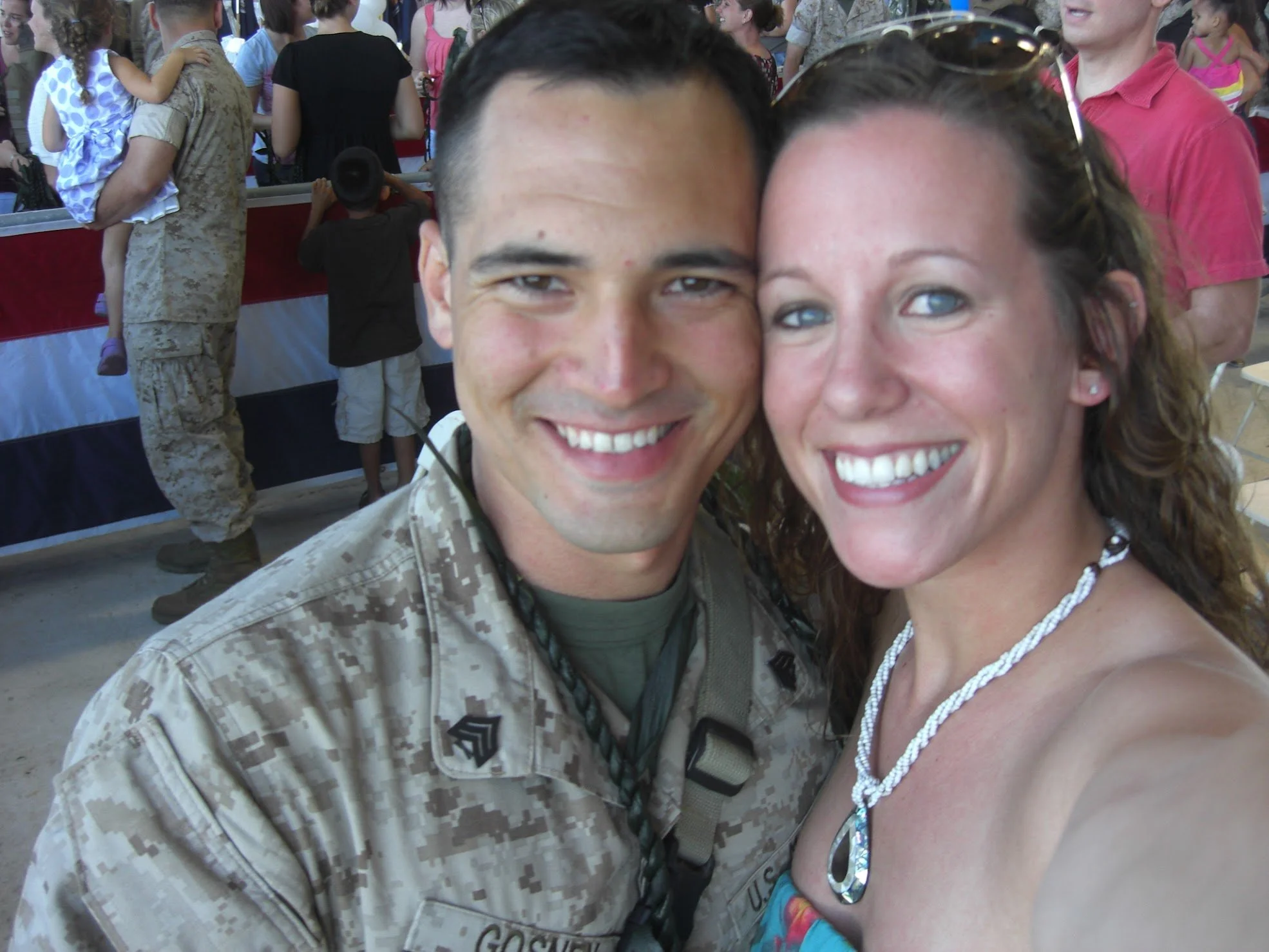 Bryce Gosney returning from Afghanistan standing with his wife representing military experience and PTSD-informed care in Ogden Utah