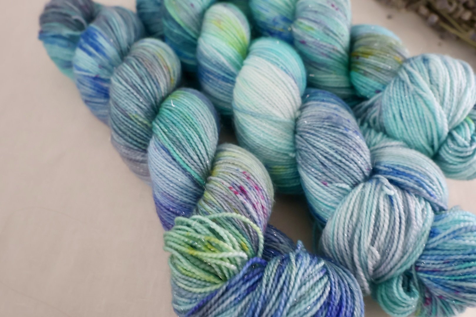 Inspired by Scotland’s evening shoreline, Gloaming Waters blends ocean blues with soft tonal depth. Hand‑dyed 4‑ply merino/nylon perfect for socks and shawls.