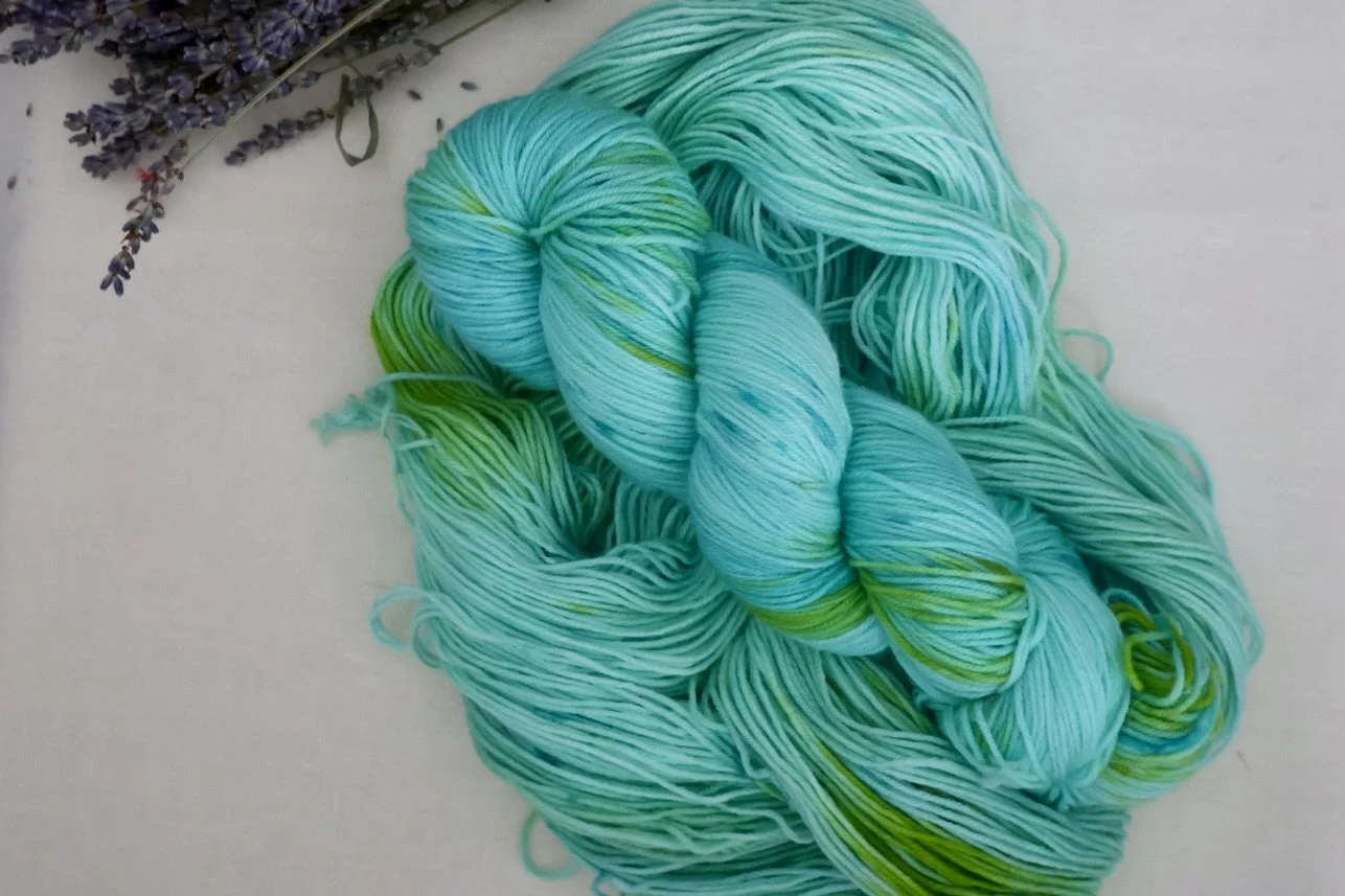 Hand‑dyed 4‑ply merino/nylon yarn inspired by Scotland’s sea‑kelp forests and tidal blues. Ideal for socks, shawls, mitts, and fine‑gauge garments.