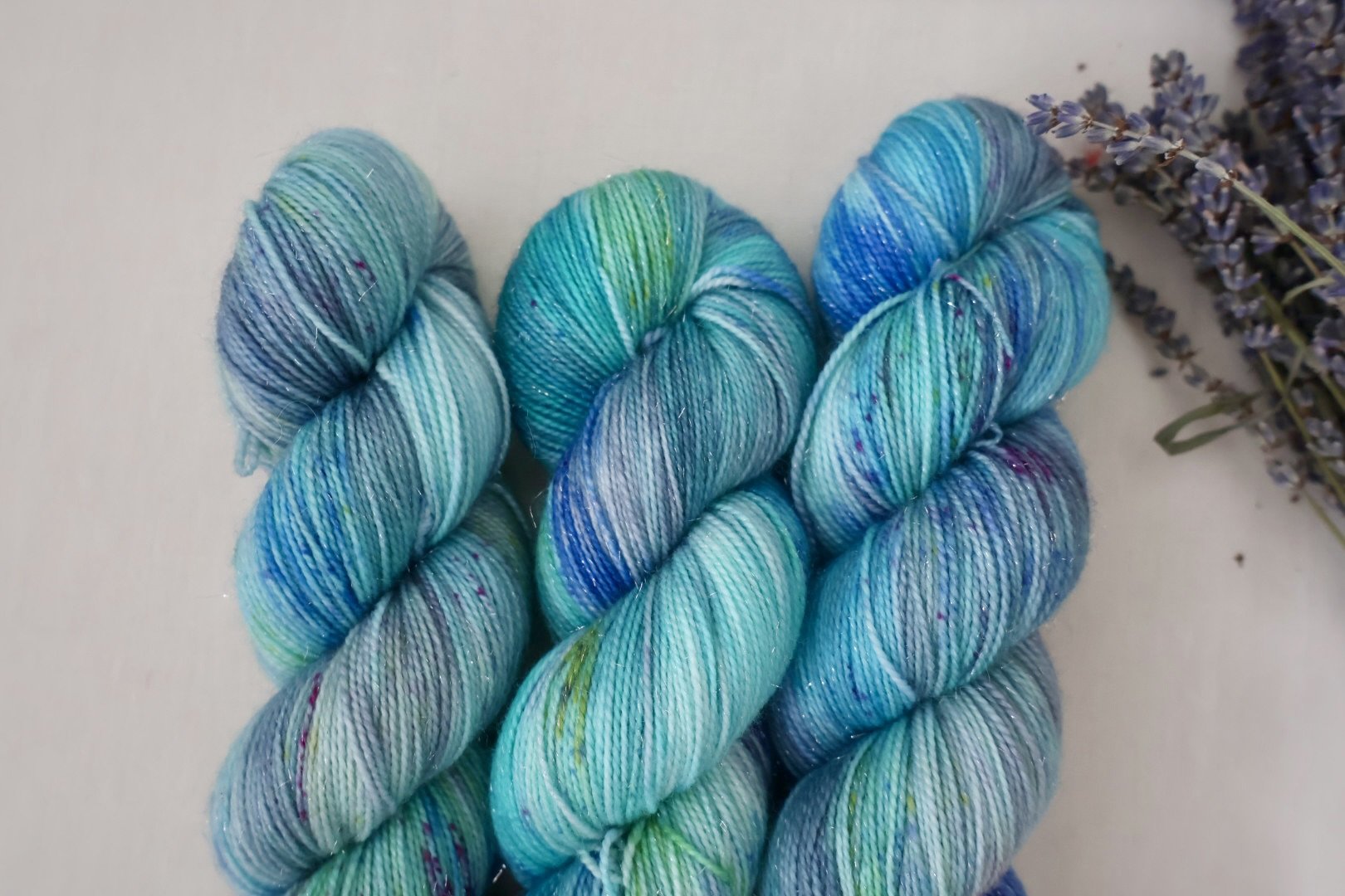 A moody, atmospheric colourway inspired by the quiet hour between day and night. Gloaming Waters features deep blues and soft tonal shifts on a 4‑ply merino/nylon base.
