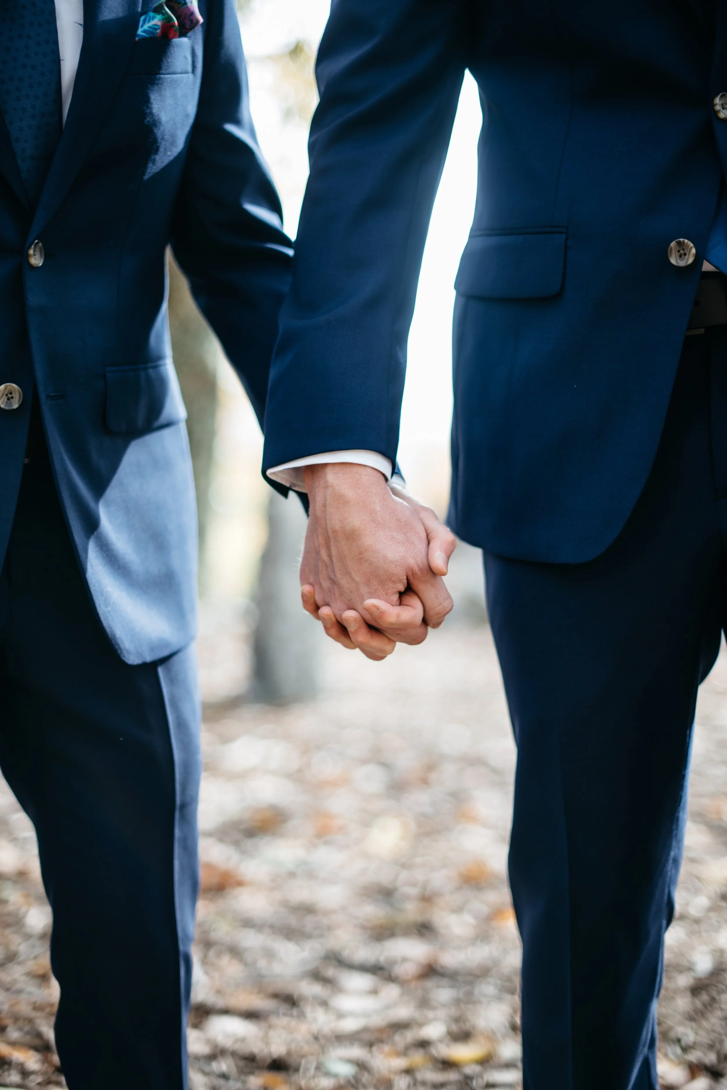 Couple holding hands