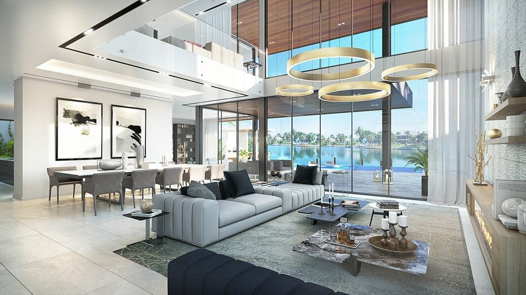Modern living room with large glass windows overlooking a lake, featuring a white sofa with black pillows, a coffee table, and contemporary lighting fixtures.