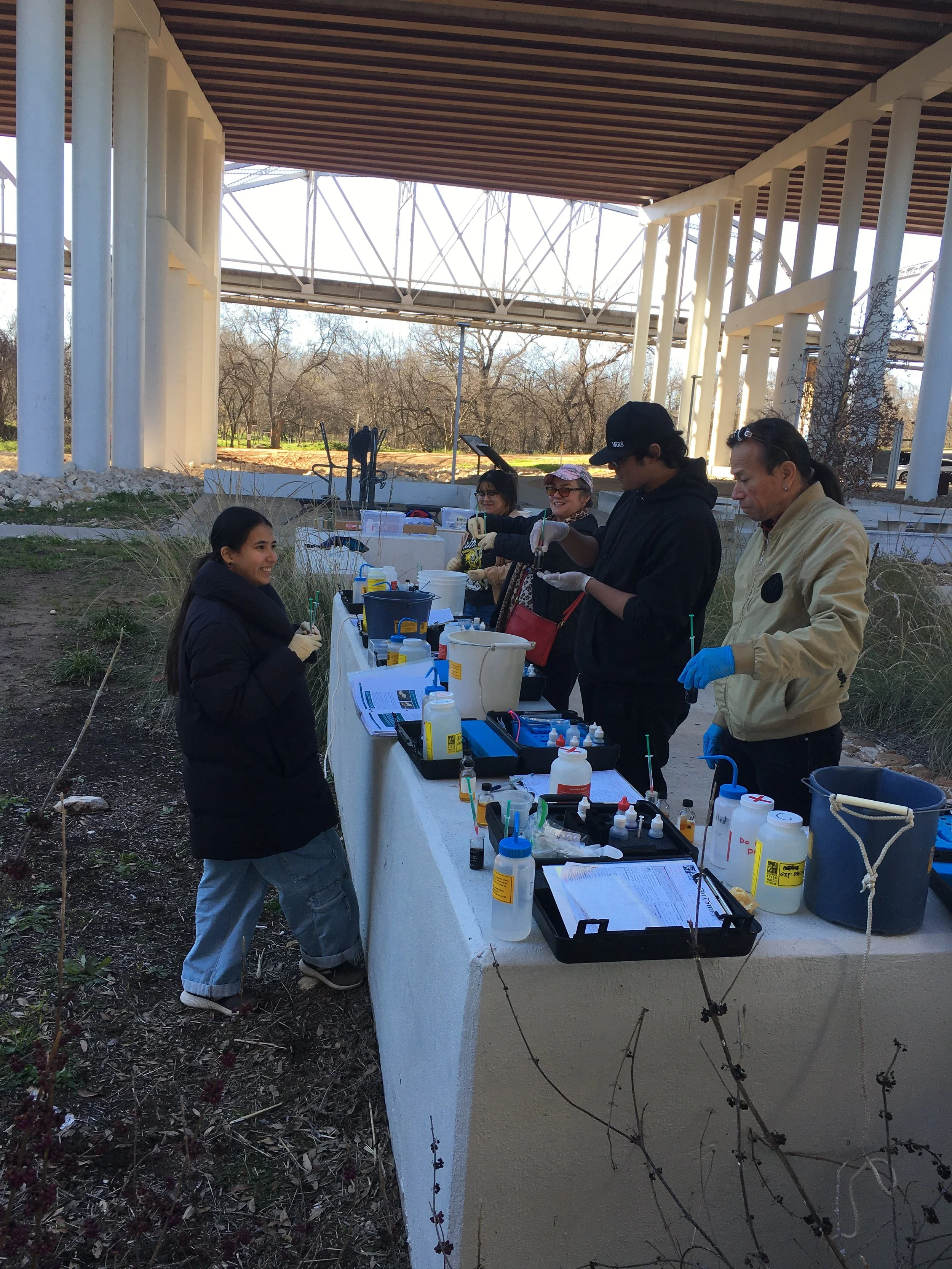 Alexia Leclercq leading a water quality training in East Austin