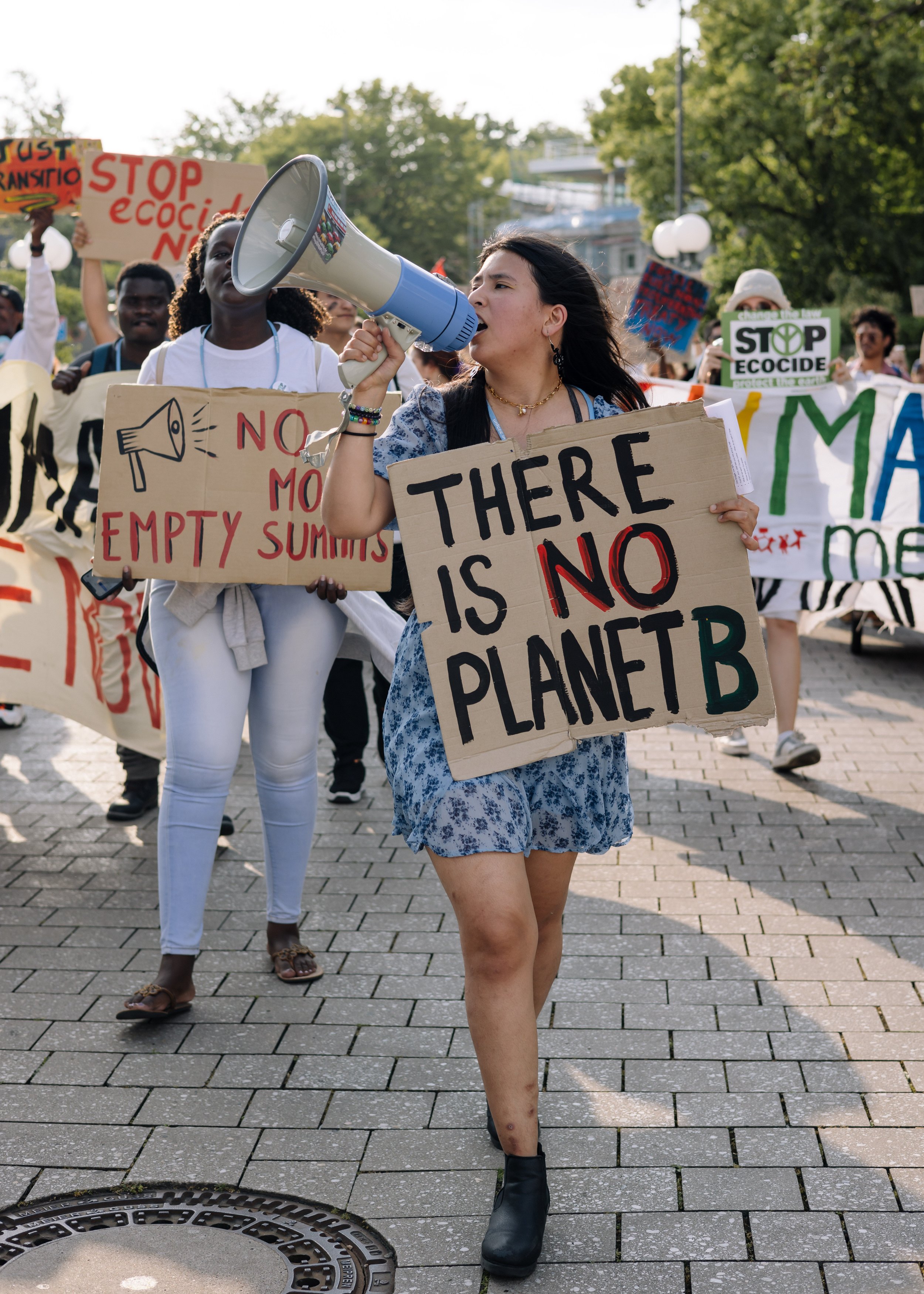 Alexia Leclercq speaking at a climate justice protest in Bonn Germany