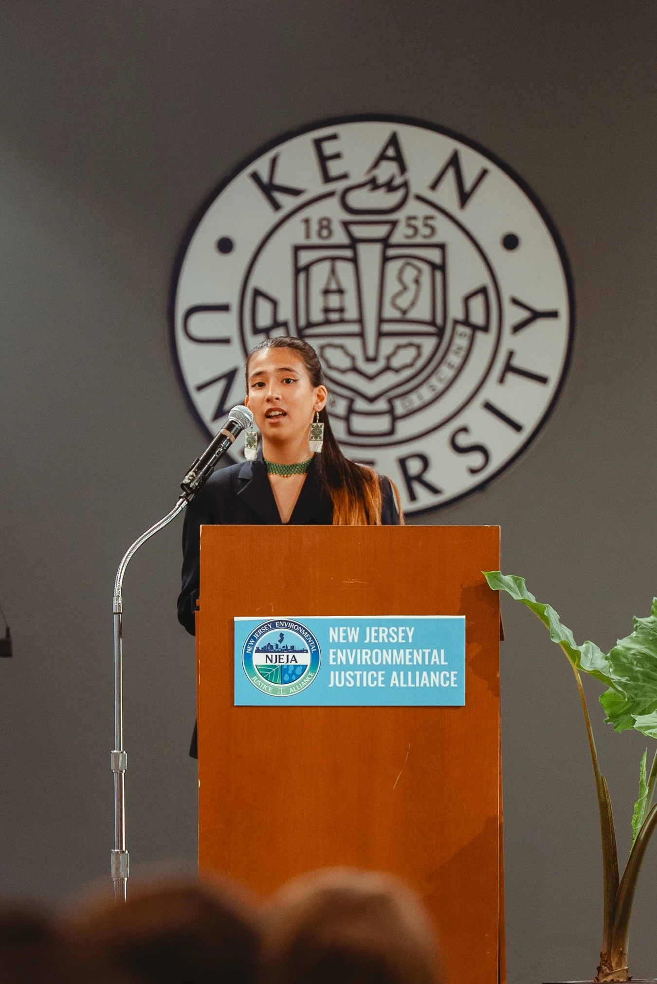 Alexia Leclercq speaking giving a speech at the New Jersey Environmental Justice Alliance event at Rutgers University.