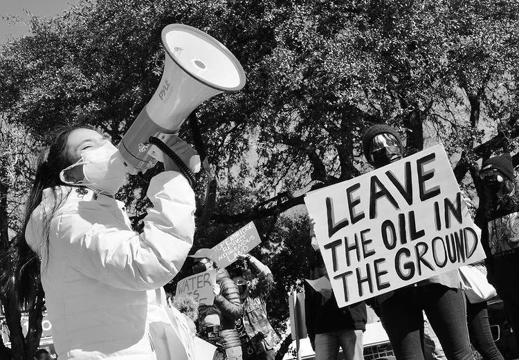 Alexia Leclercq speaking at protest against an oil pipeline