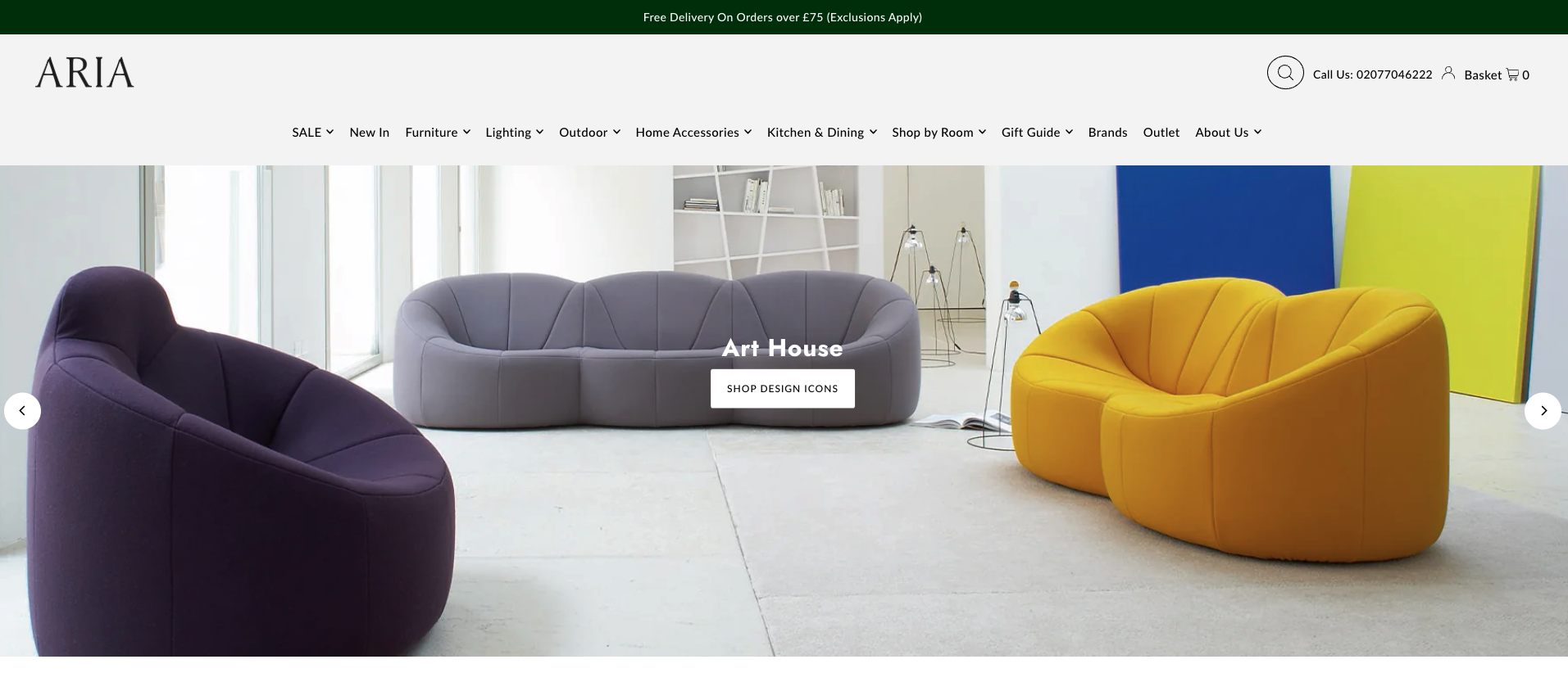 Colorful modern armchairs in purple, gray, and yellow in a bright, minimalist living space.