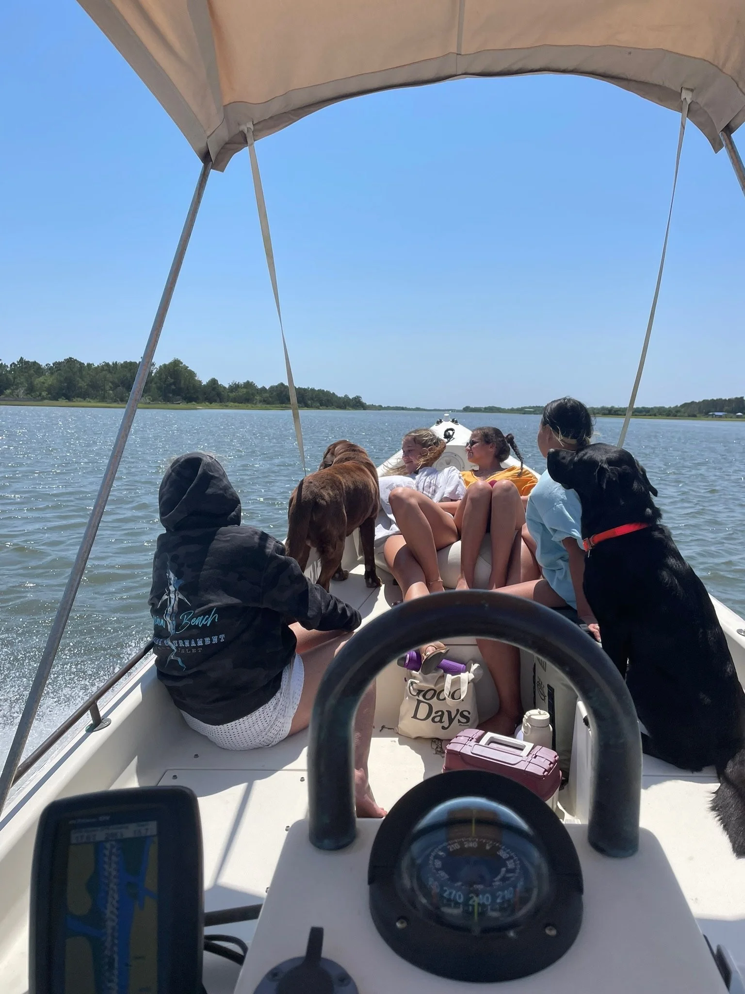 A family on a boating tour in Swansboro, North Carolina.