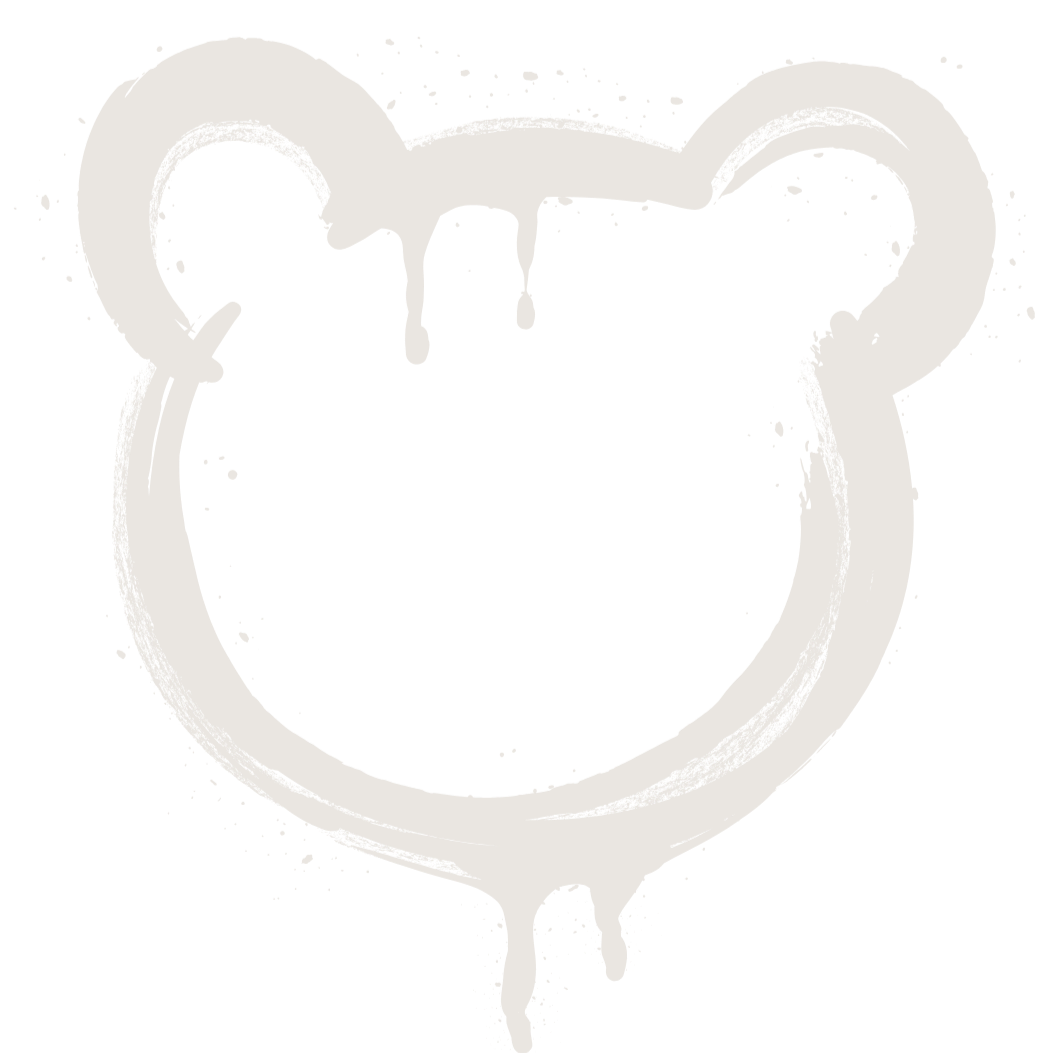 Graffiti art of a bear-shaped outline with dripping paint, in black and white.