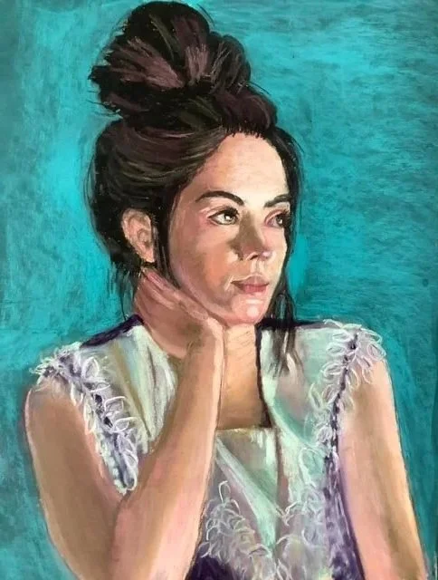 A painting of a woman with dark hair in a messy bun, resting her chin on her hand, wearing a light-colored top with lace details, against a teal background.
