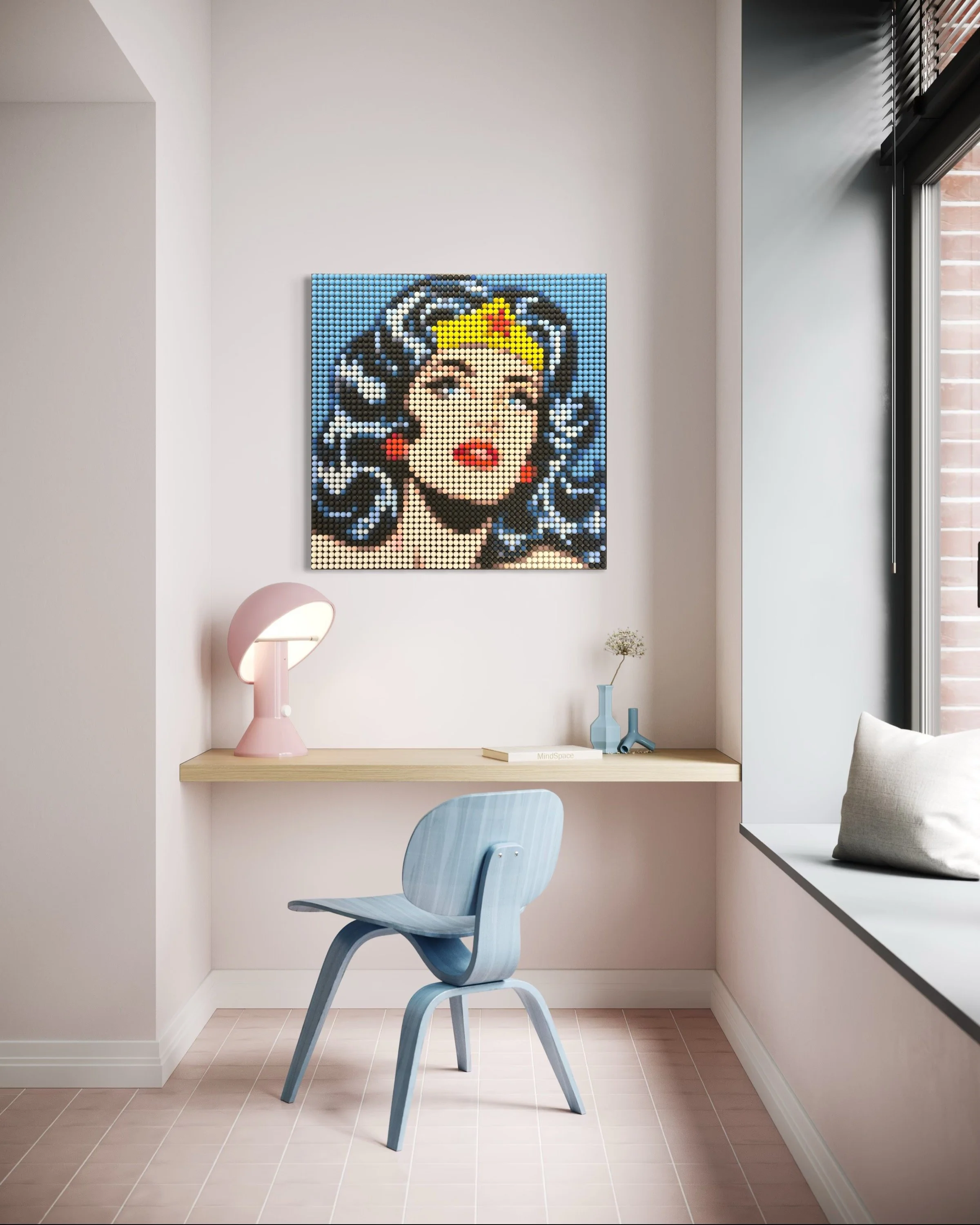 Interior of a modern room with a desk, blue chair, decorative vases, and a colorful pixel art of a woman with black hair, red lips, and a yellow crown on the wall.