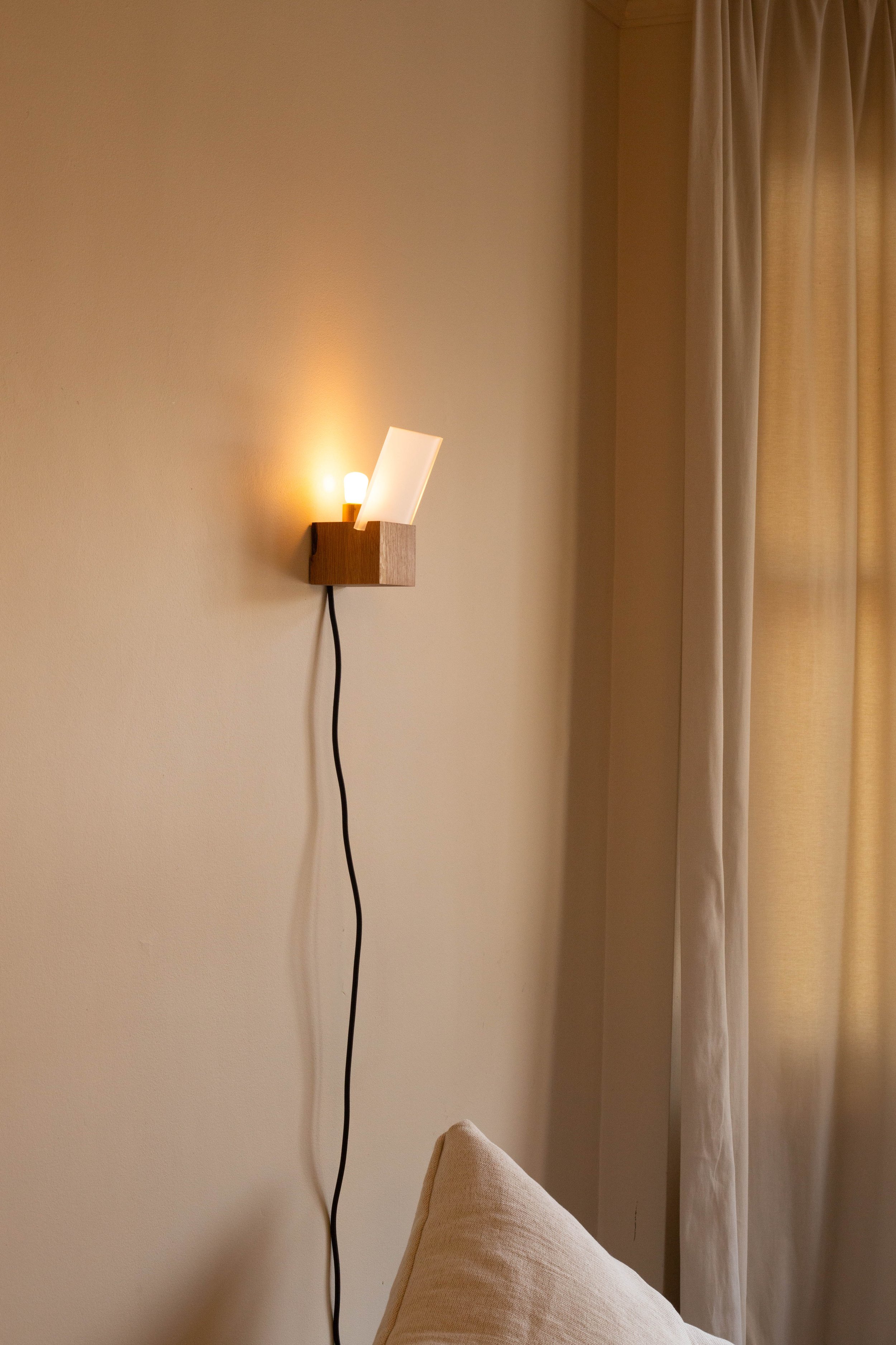 JA1 block sculptural wall light, side view, natural wood grain