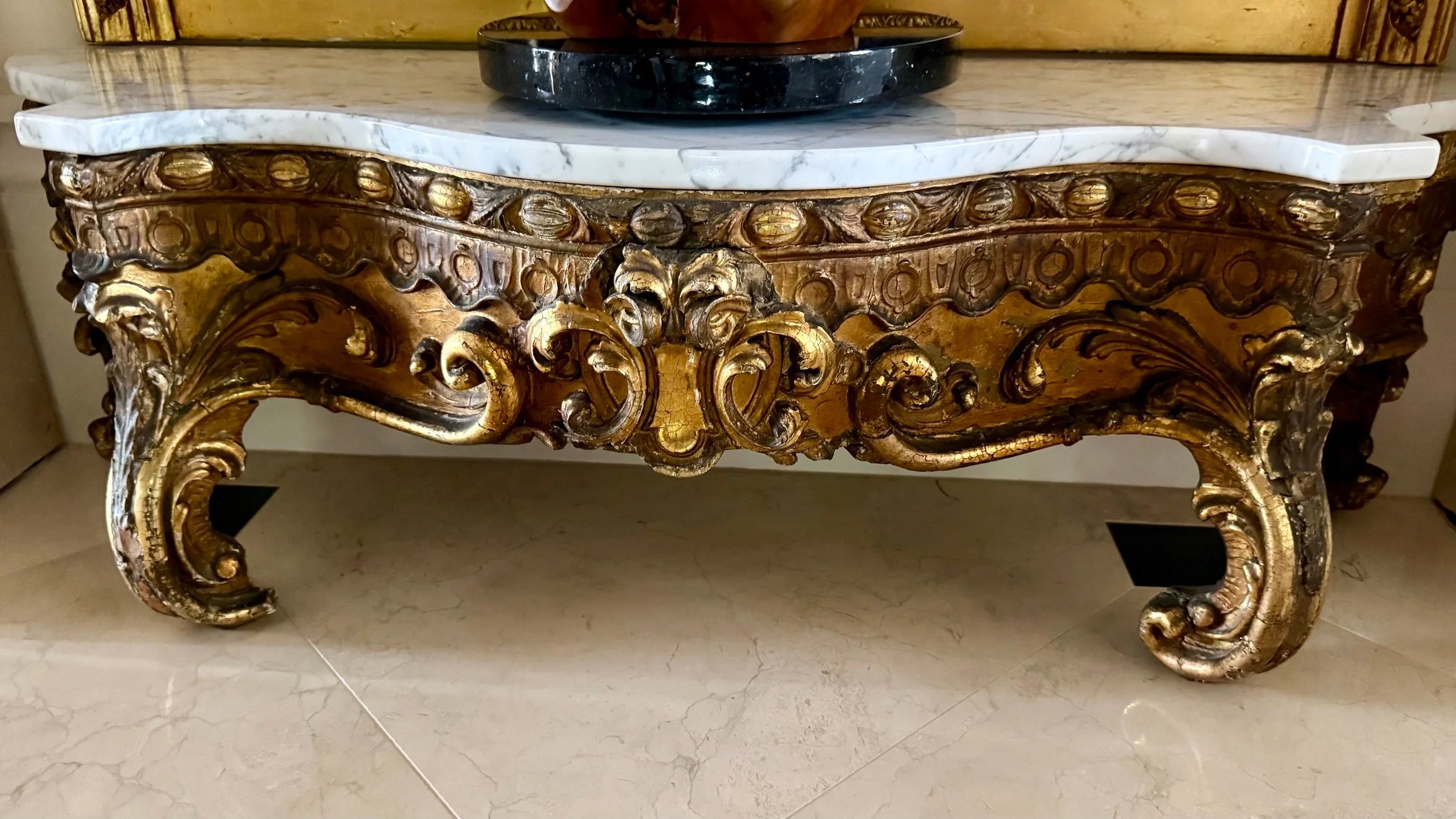 An Antique Italian Rococo-Style Gilded and Carved Low Console