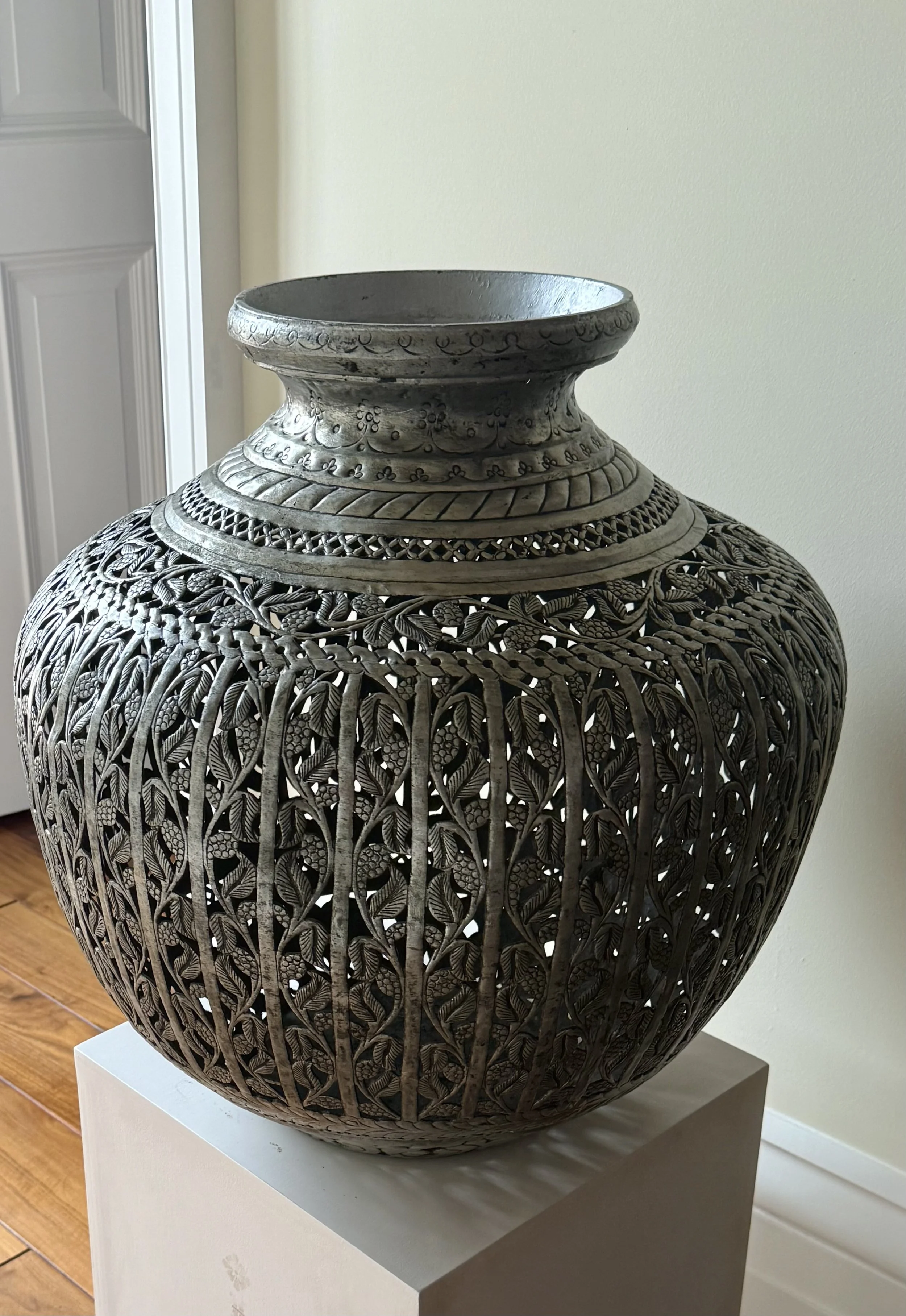 Hand-hammered, pierced metal vase/urn